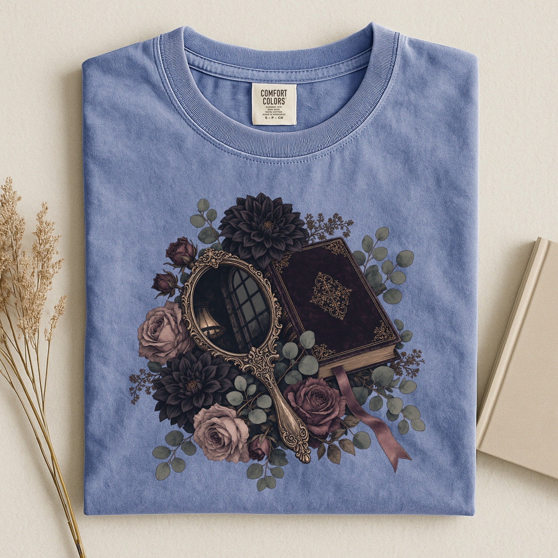 Moody Mirror and Roses bookish tee in Blue Jean, flat lay