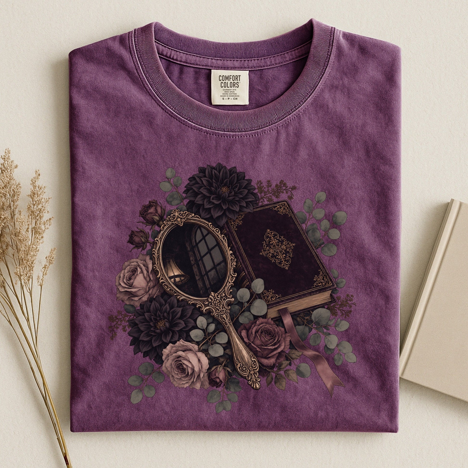 Moody Mirror and Roses bookish tee in Berry, flat lay