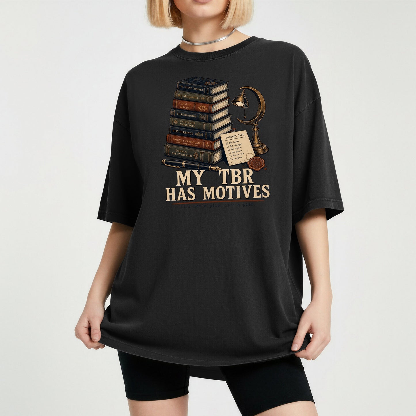 My TBR Has Motives bookish tee in Black, worn