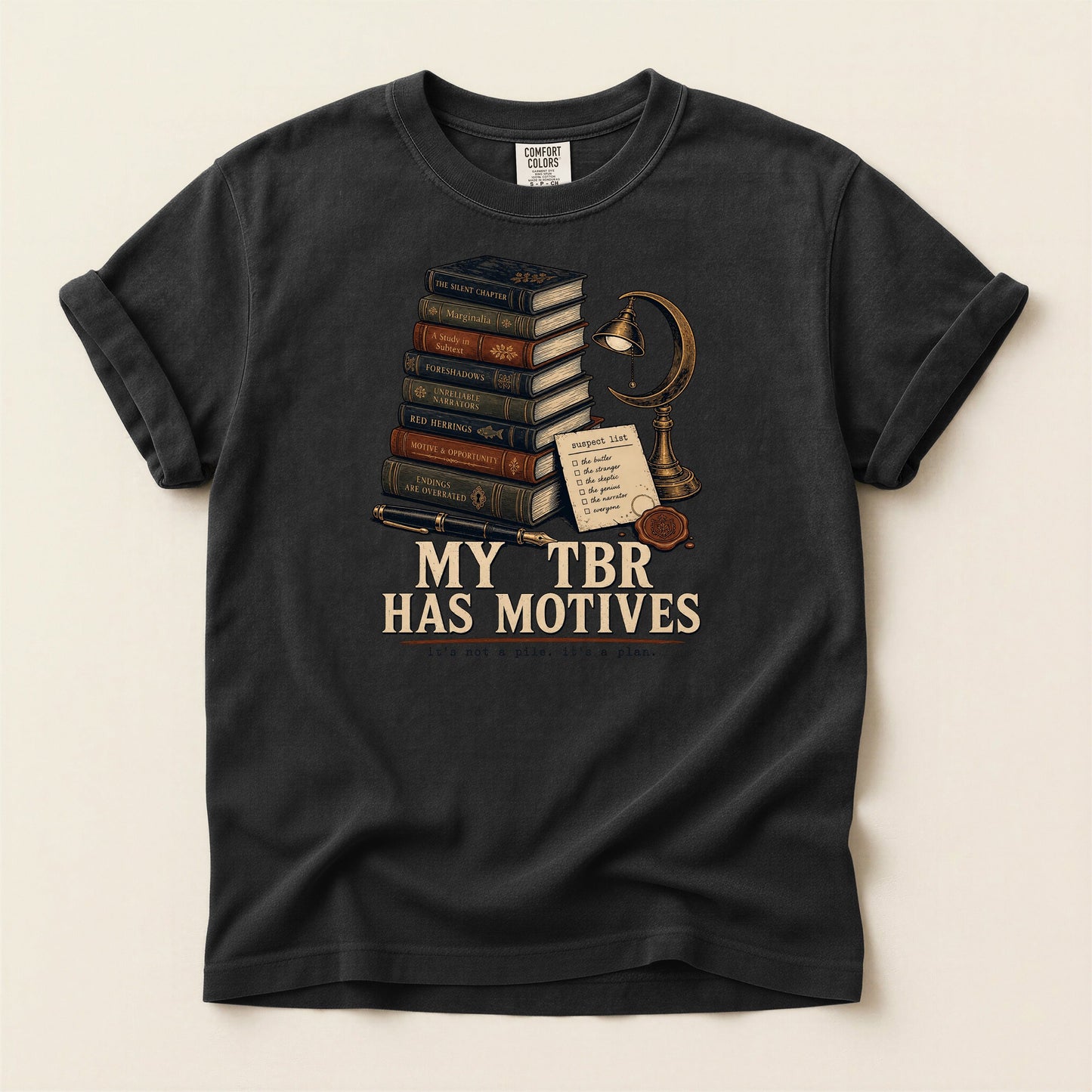 My TBR Has Motives bookish tee in Black, full flat