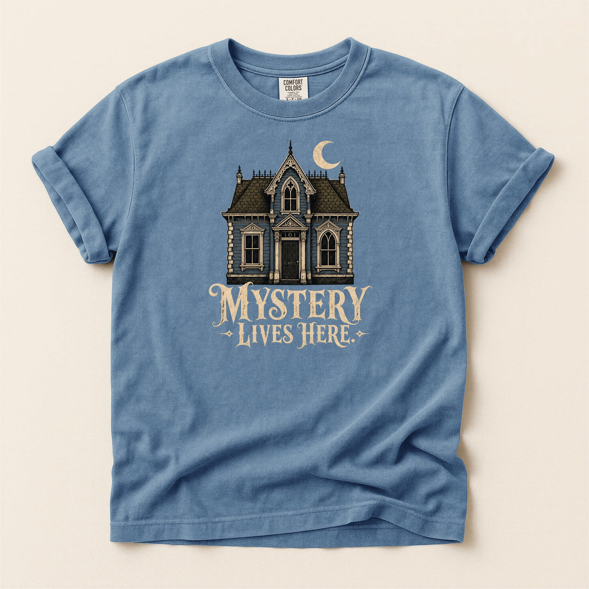 Shelf Love Studio Mystery Lives Here t-shirt in Blue Jean, flat