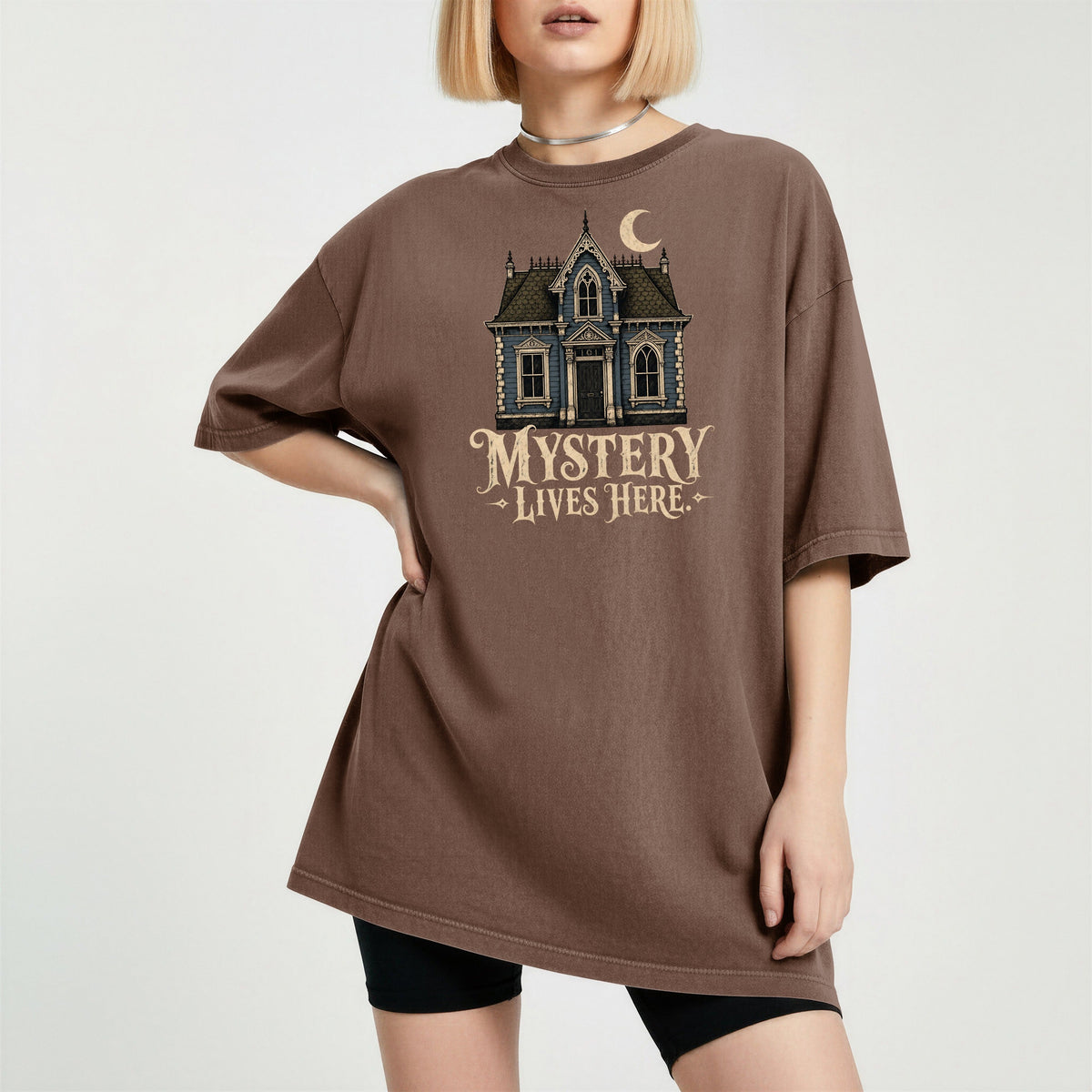 Shelf Love Studio Mystery Lives Here t-shirt in Espresso, worn