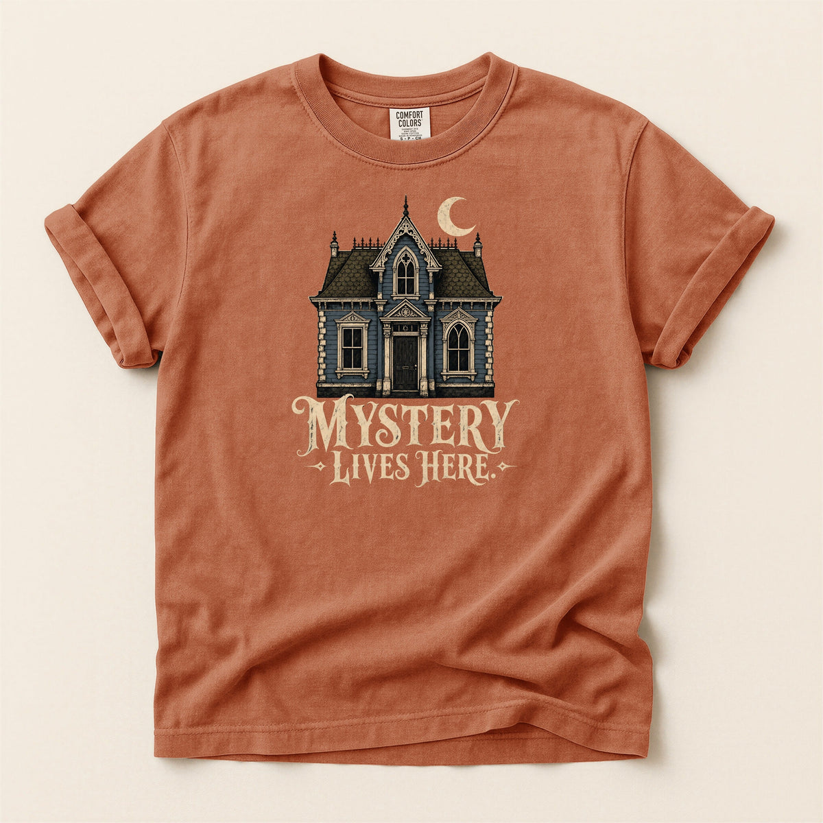 Shelf Love Studio Mystery Lives Here t-shirt in Yam, flat