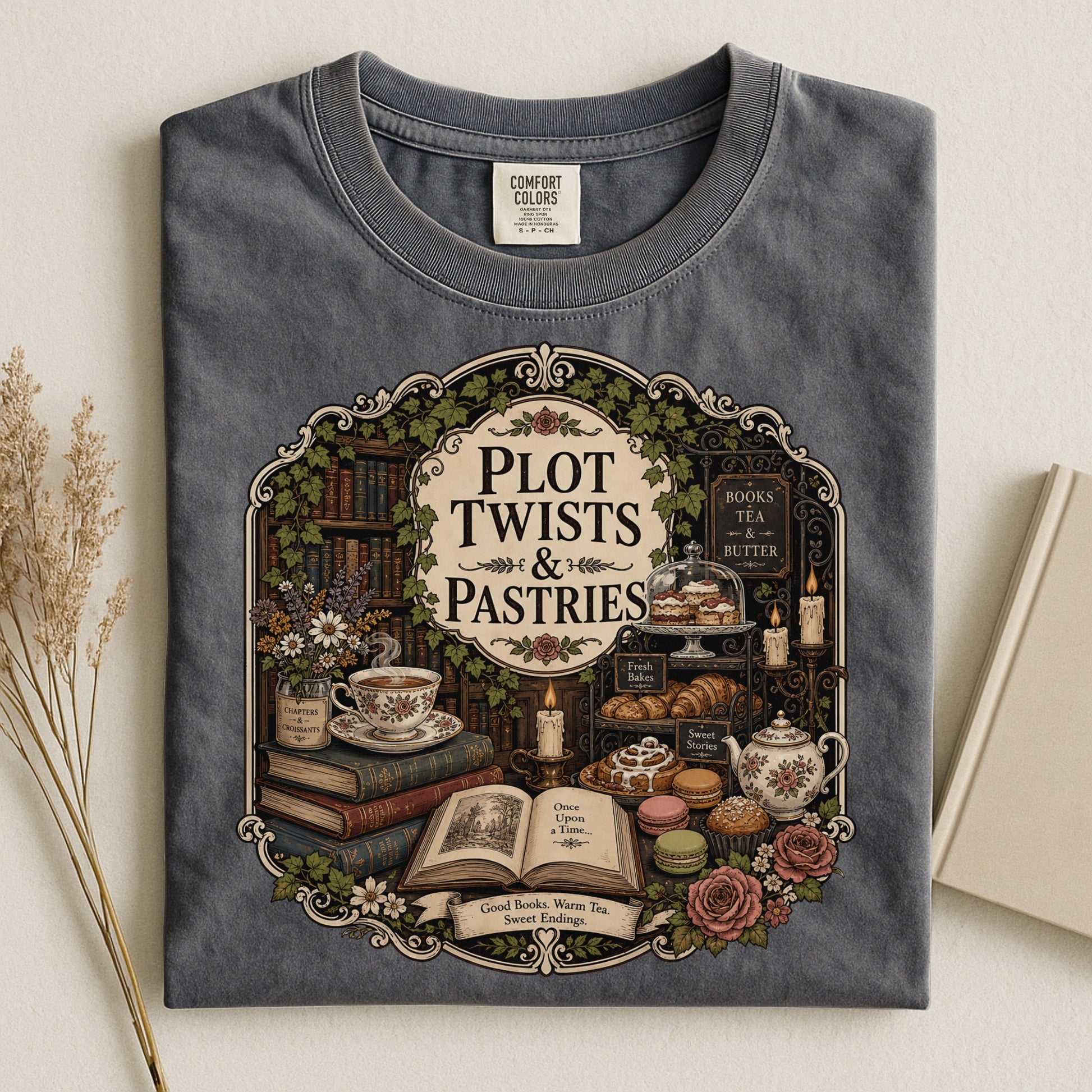 Plot Twists and Pastries bookish tee in Pepper, flat lay