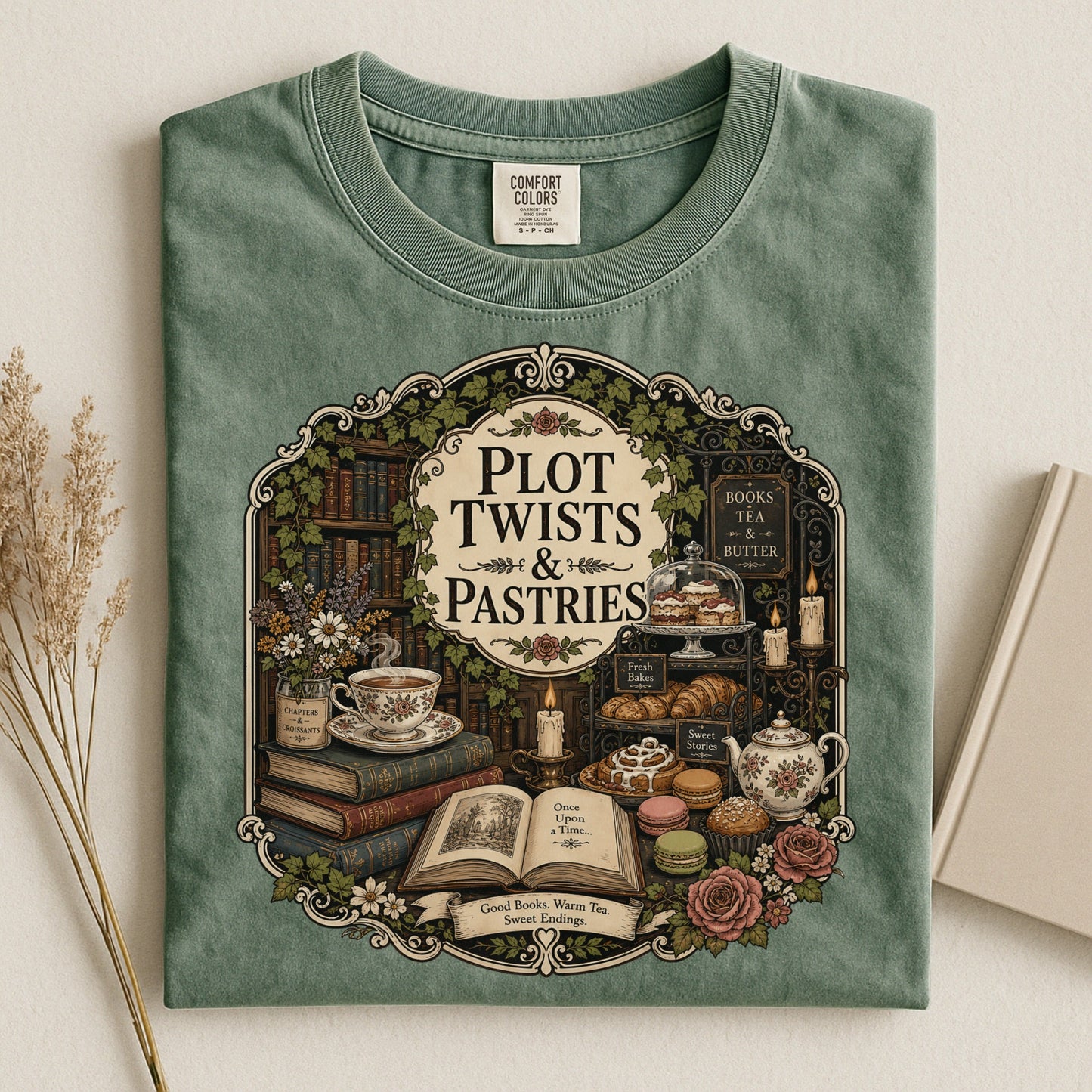Plot Twists and Pastries bookish tee in Moss, flat lay