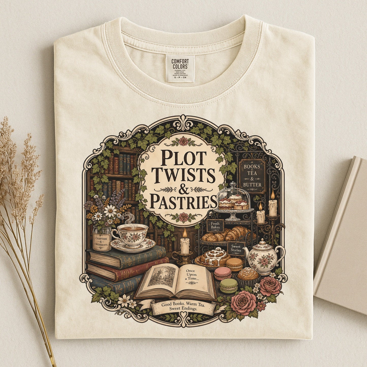 Plot Twists and Pastries bookish tee in Ivory, flat lay