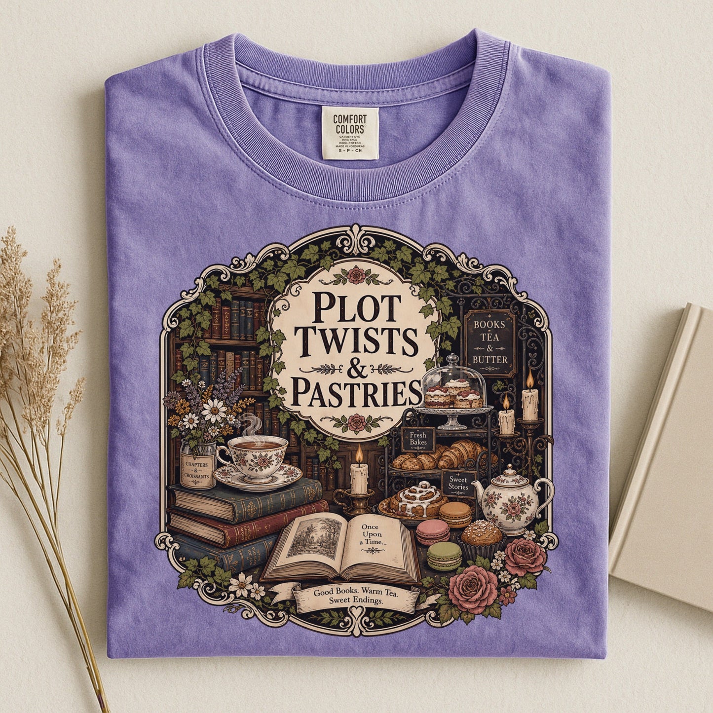 Plot Twists and Pastries bookish tee in Violet, flat lay