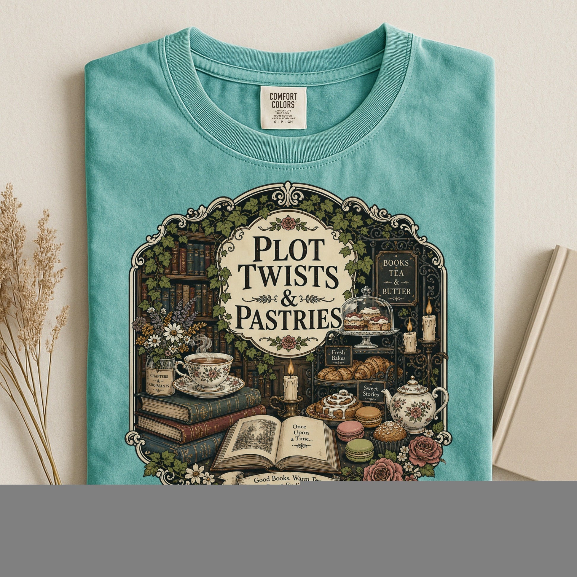 Plot Twists and Pastries bookish tee in Seafoam, flat lay