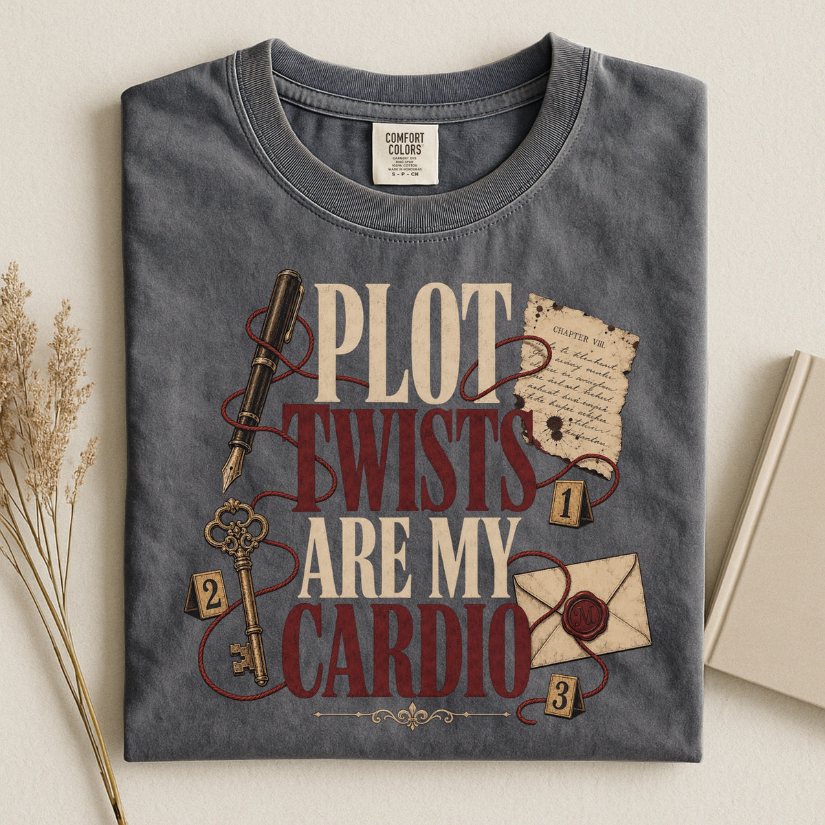 Shelf Love Studio Plot Twists Are My Cardio t-shirt in Pepper, styled flat lay