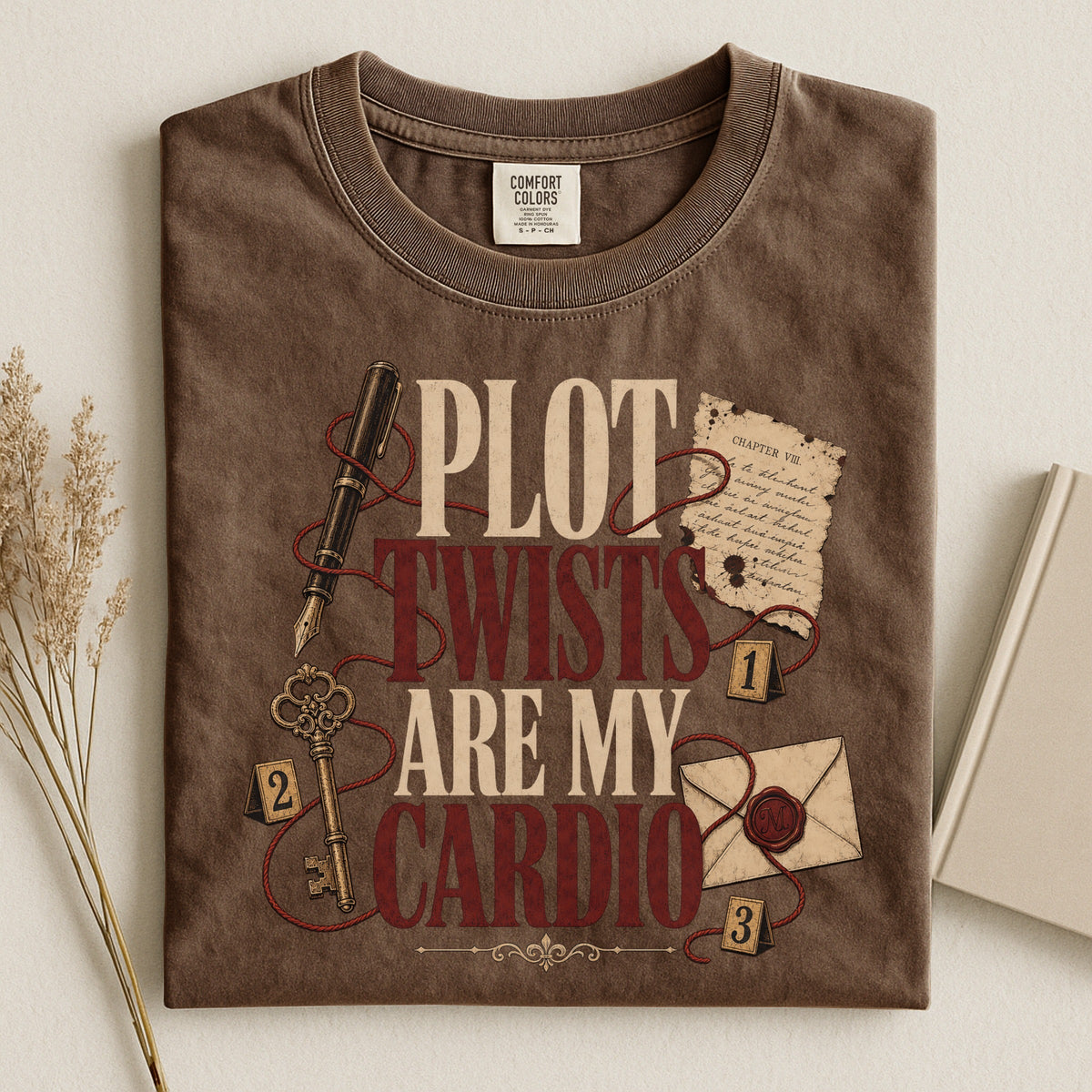 Shelf Love Studio Plot Twists Are My Cardio t-shirt in Espresso, styled flat lay