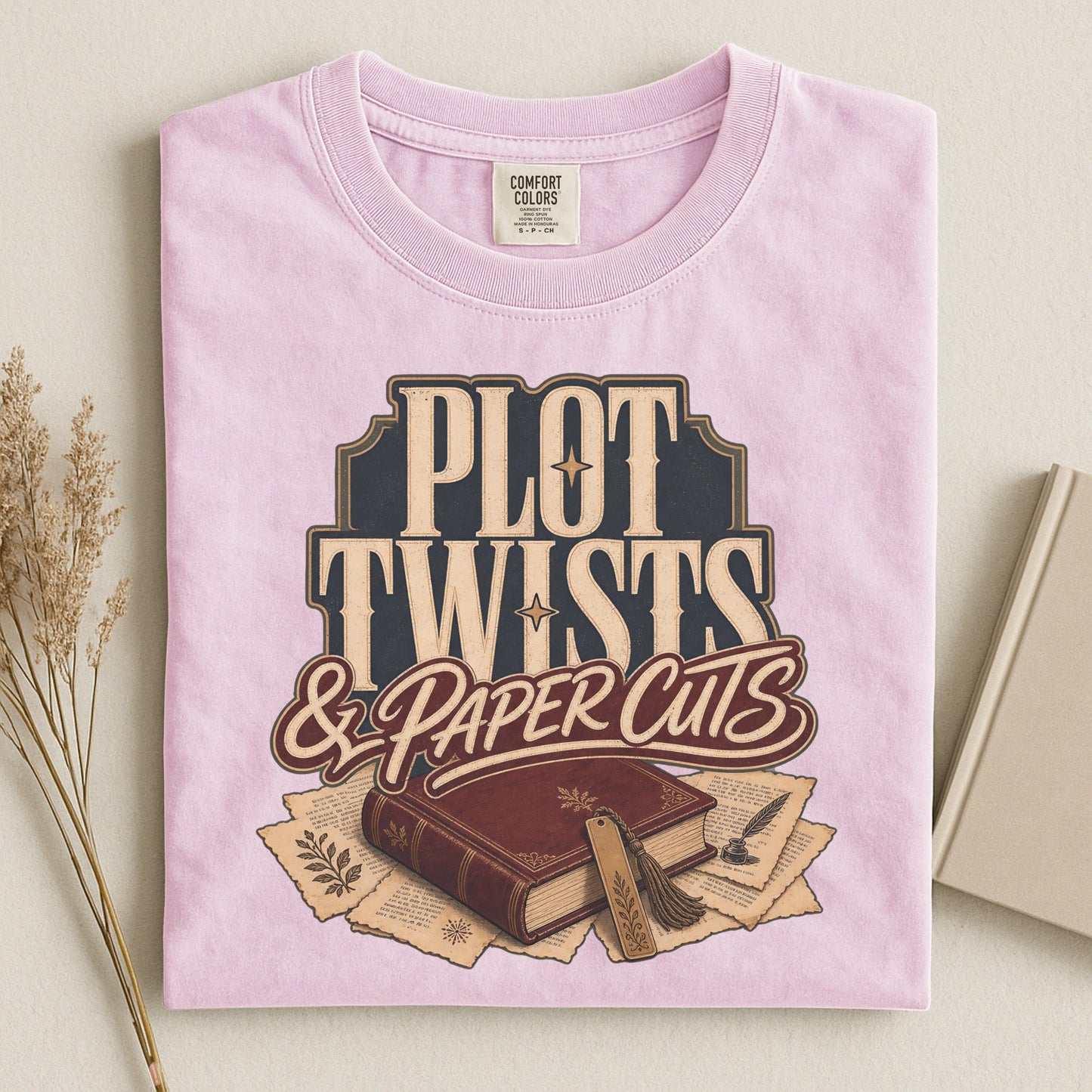 Plot Twists & Paper Cuts bookish tee in Blossom, flat lay