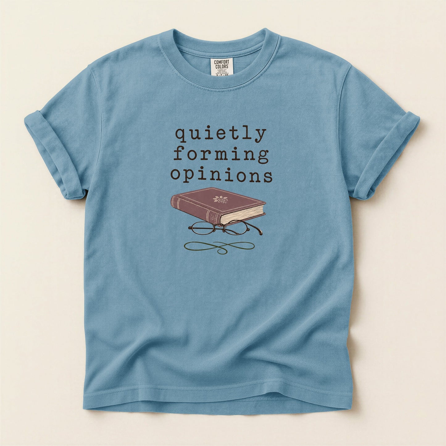 Quietly Forming Opinions bookish tee in Ice Blue, full flat