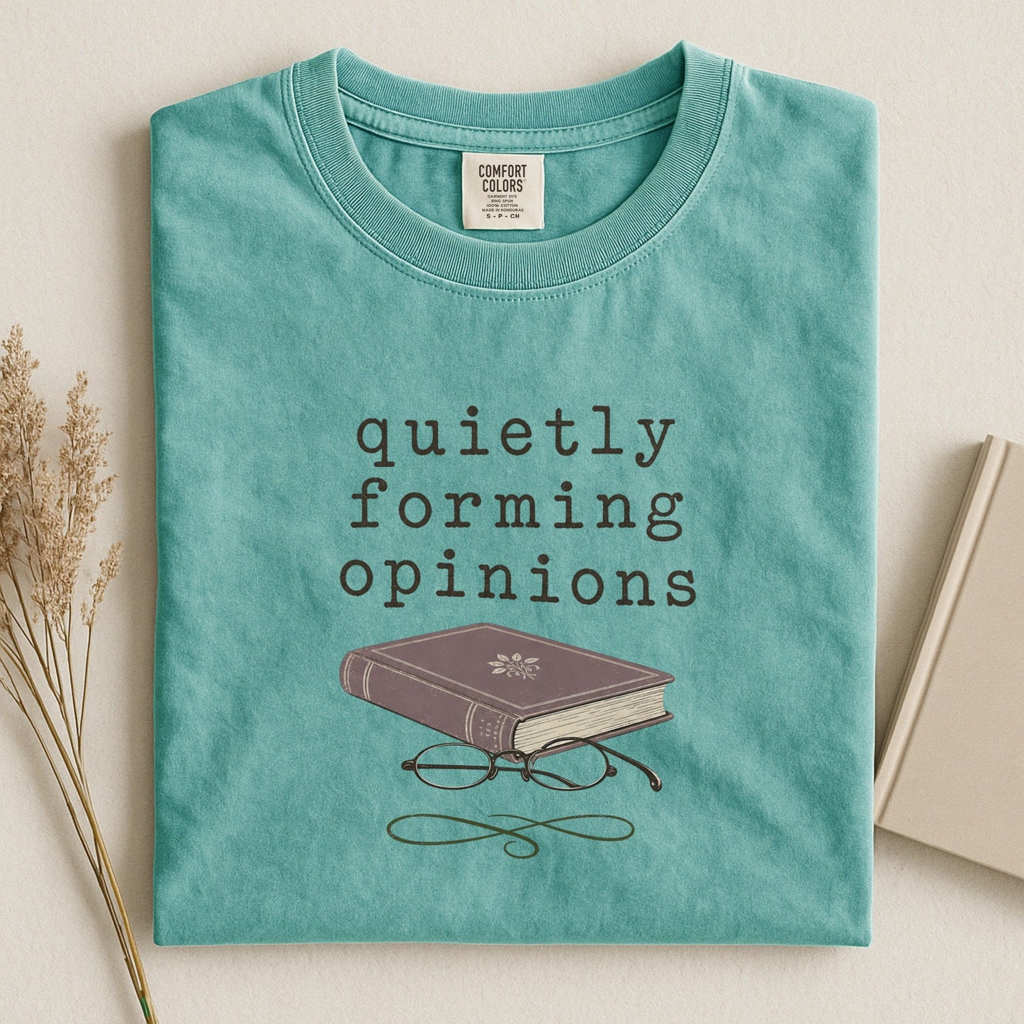 Quietly Forming Opinions bookish tee in Seafoam, flat lay