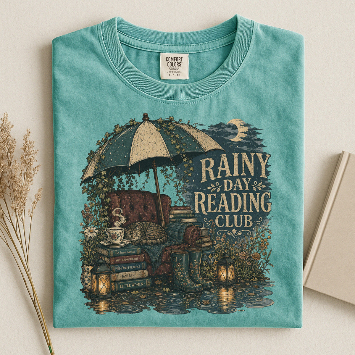 Rainy Day Reading Club bookish tee in Seafoam, flat lay