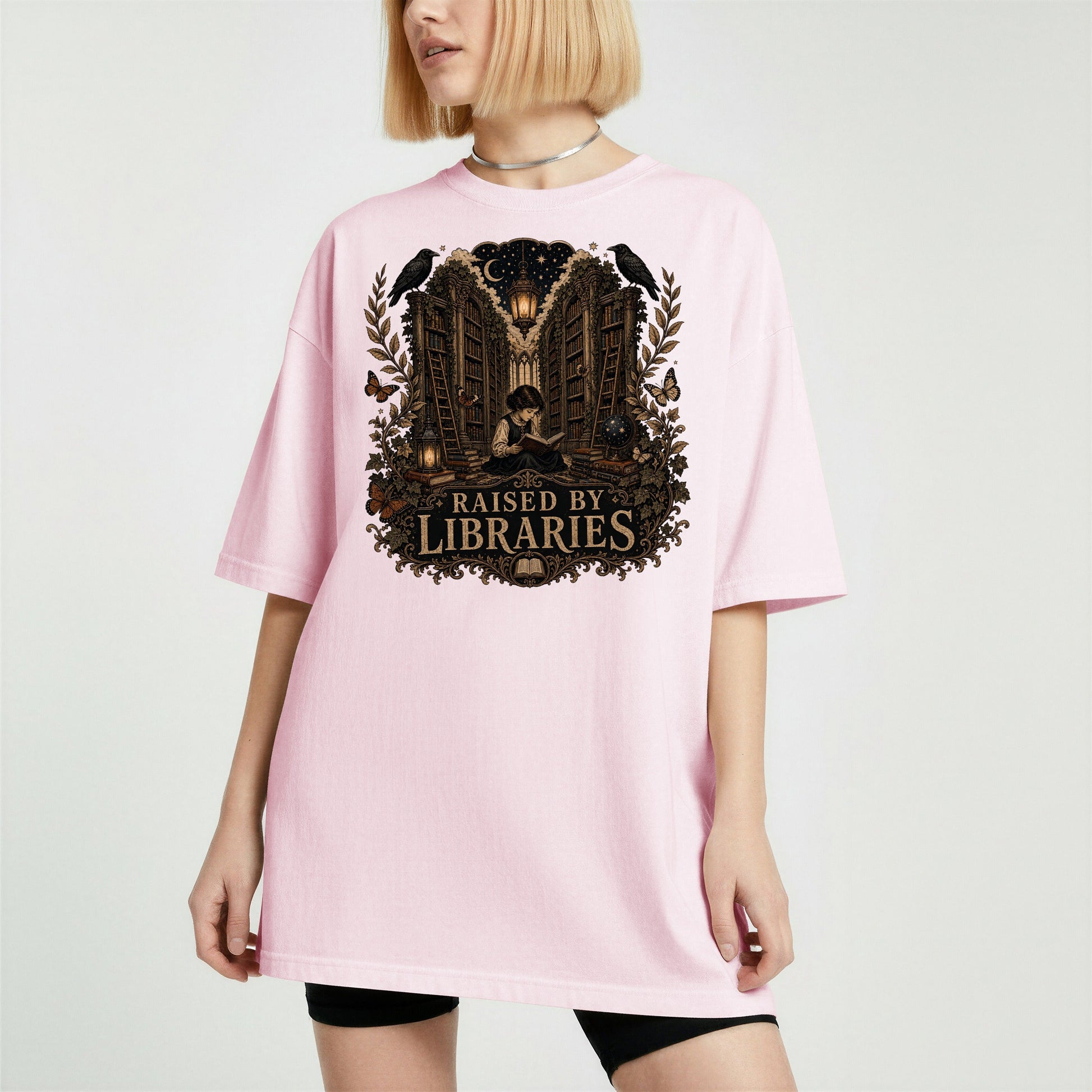 Raised by Libraries bookish tee in Blossom, worn