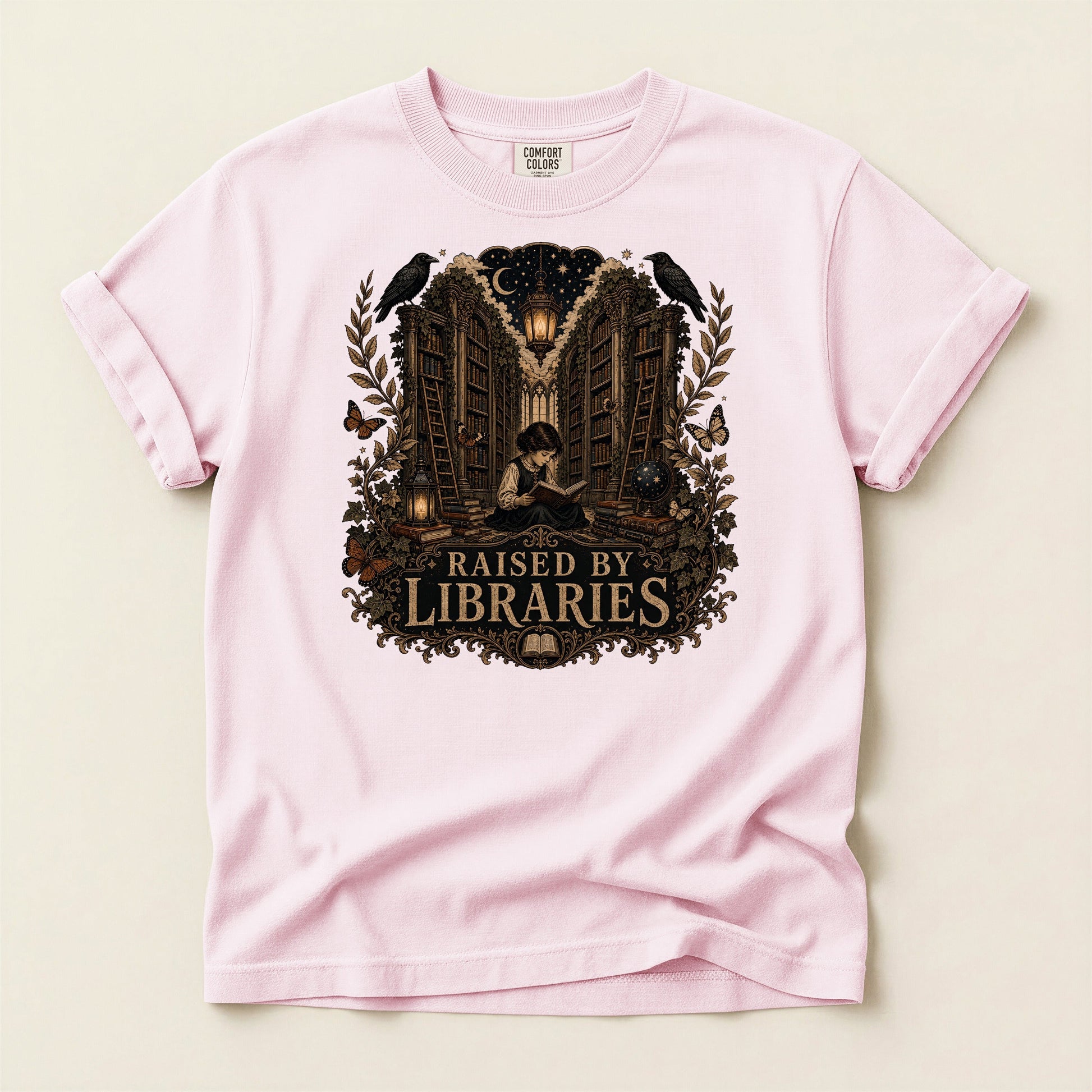 Raised by Libraries bookish tee in Blossom, full flat