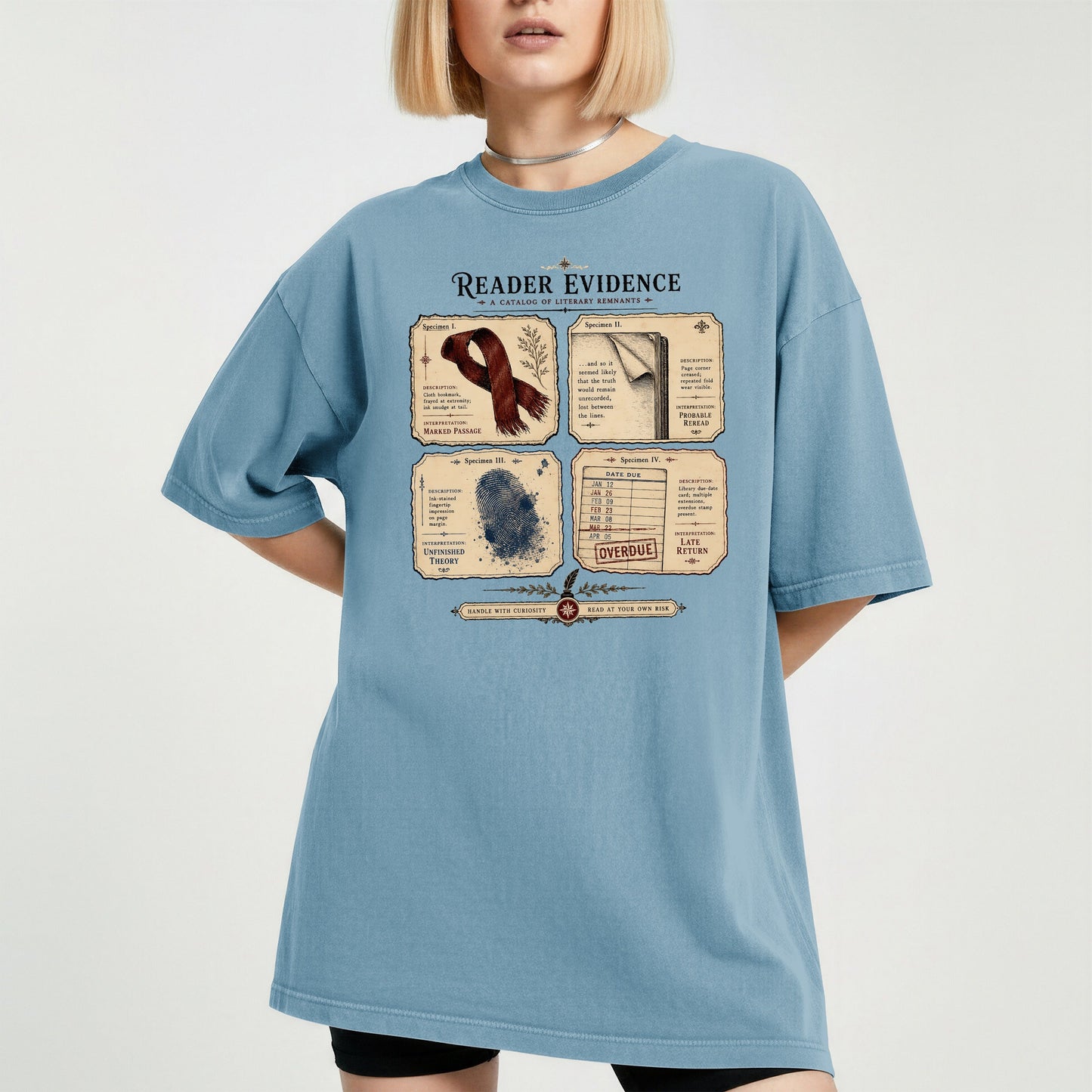 Reader Evidence bookish tee in Ice Blue, worn