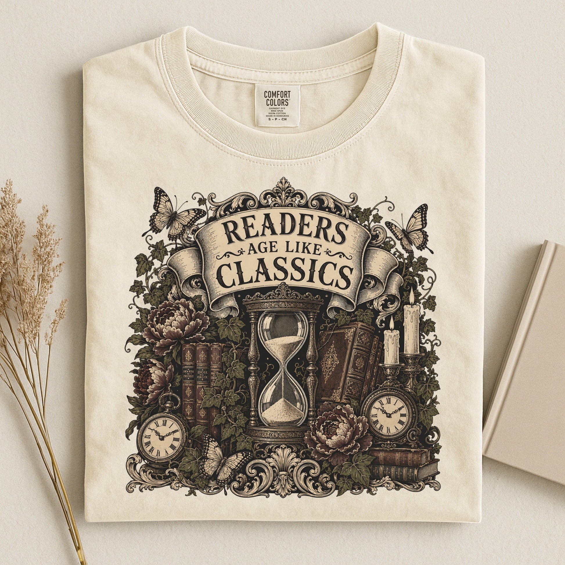 Readers Age Like Classics bookish tee in Ivory, flat lay