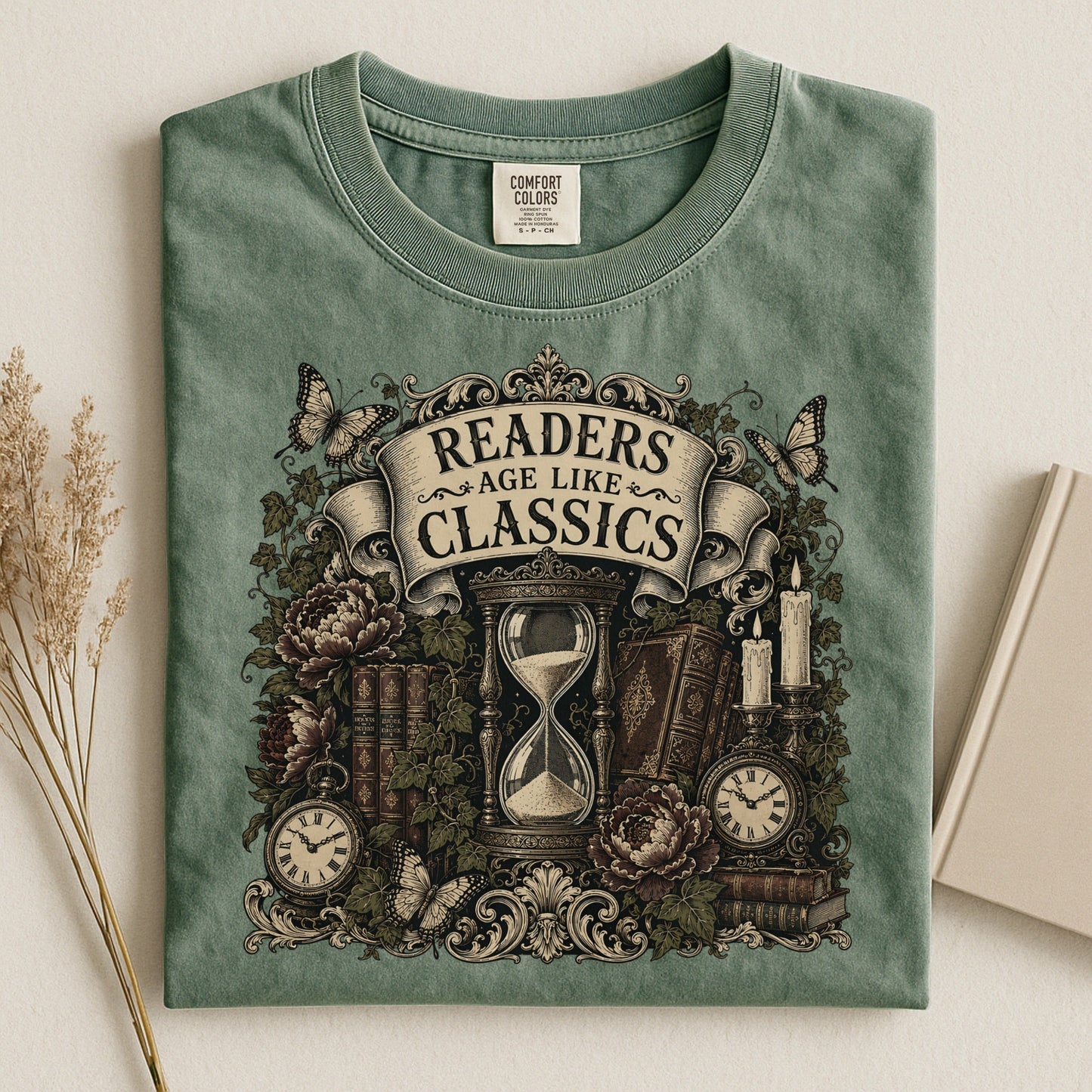 Readers Age Like Classics bookish tee in Moss, flat lay