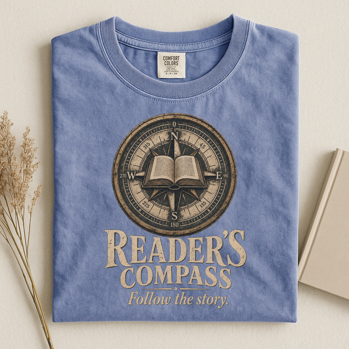 Shelf Love Studio Reader's Compass t-shirt in Blue Jean, styled flat lay