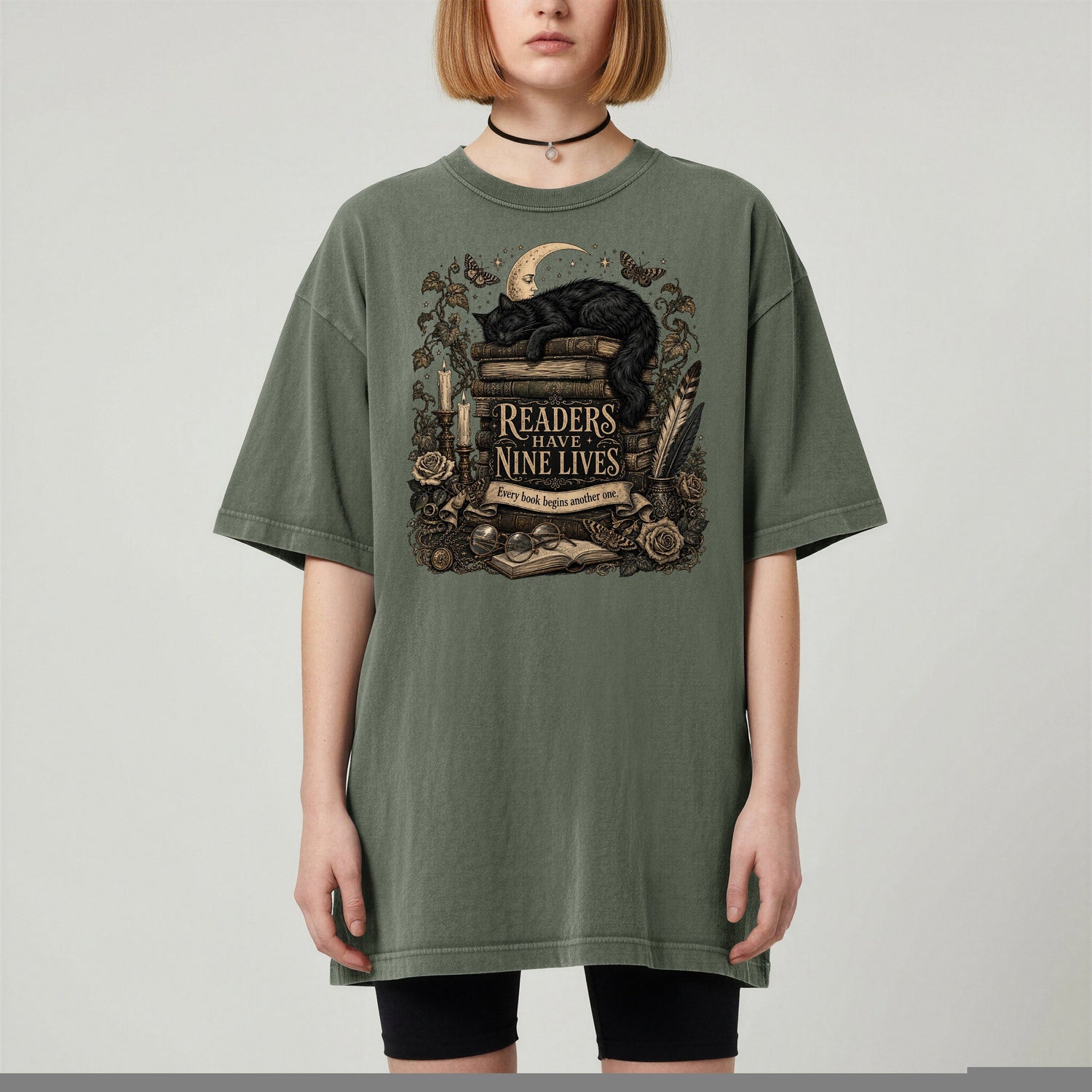 Readers Have Nine Lives bookish tee in Moss, worn