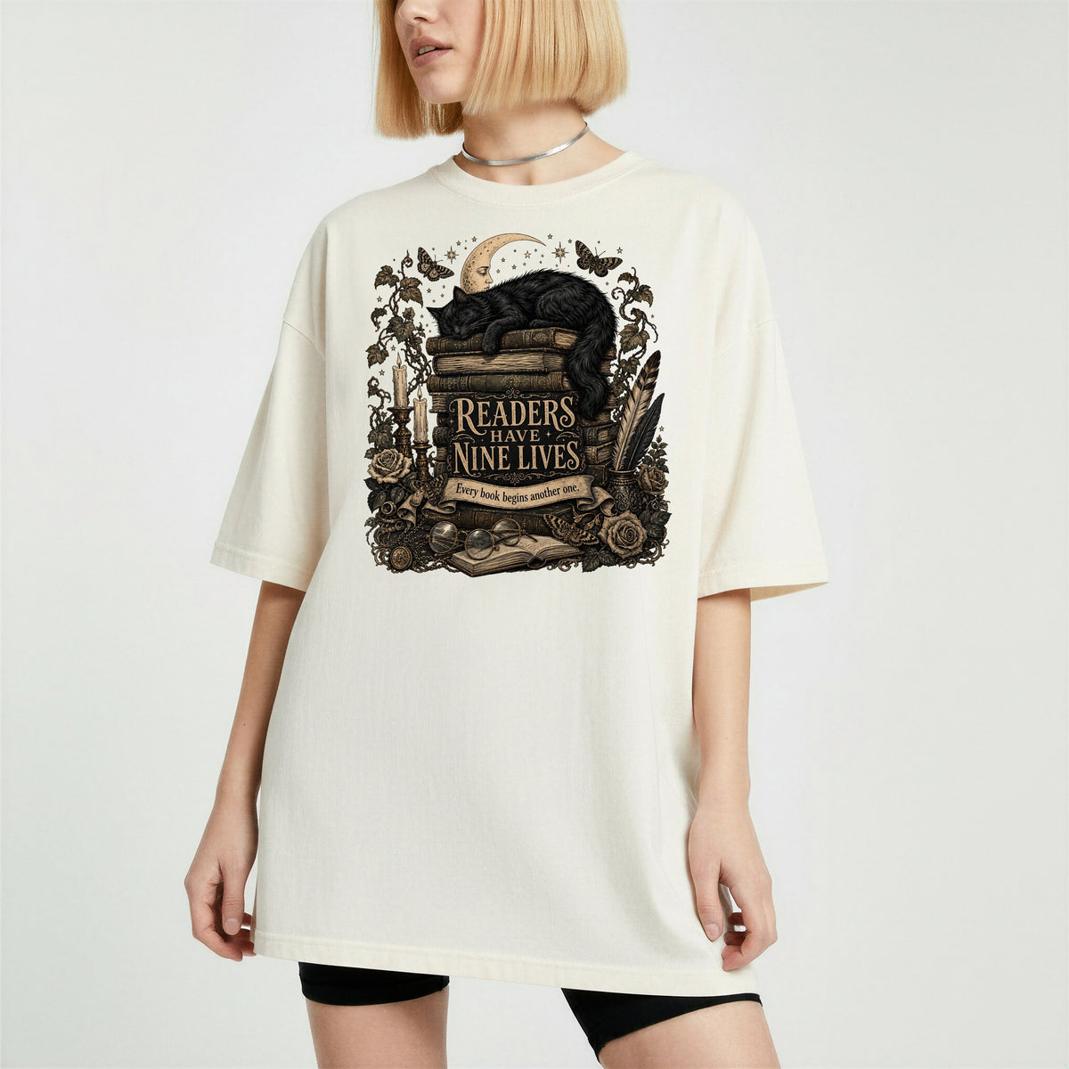 Readers Have Nine Lives bookish tee in Ivory, worn