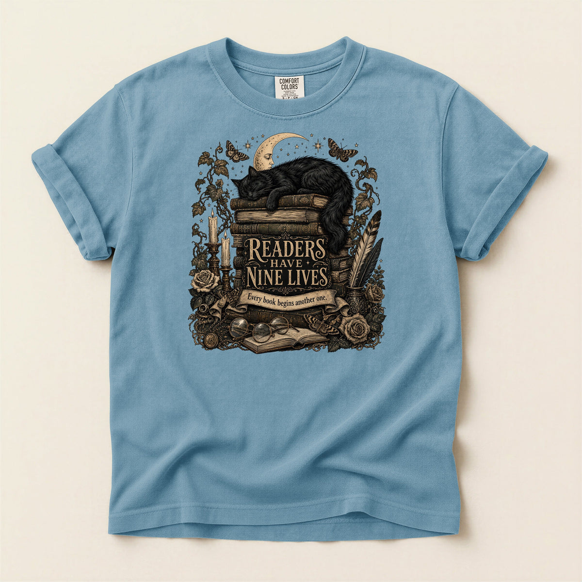 Readers Have Nine Lives bookish tee in Ice Blue, full flat