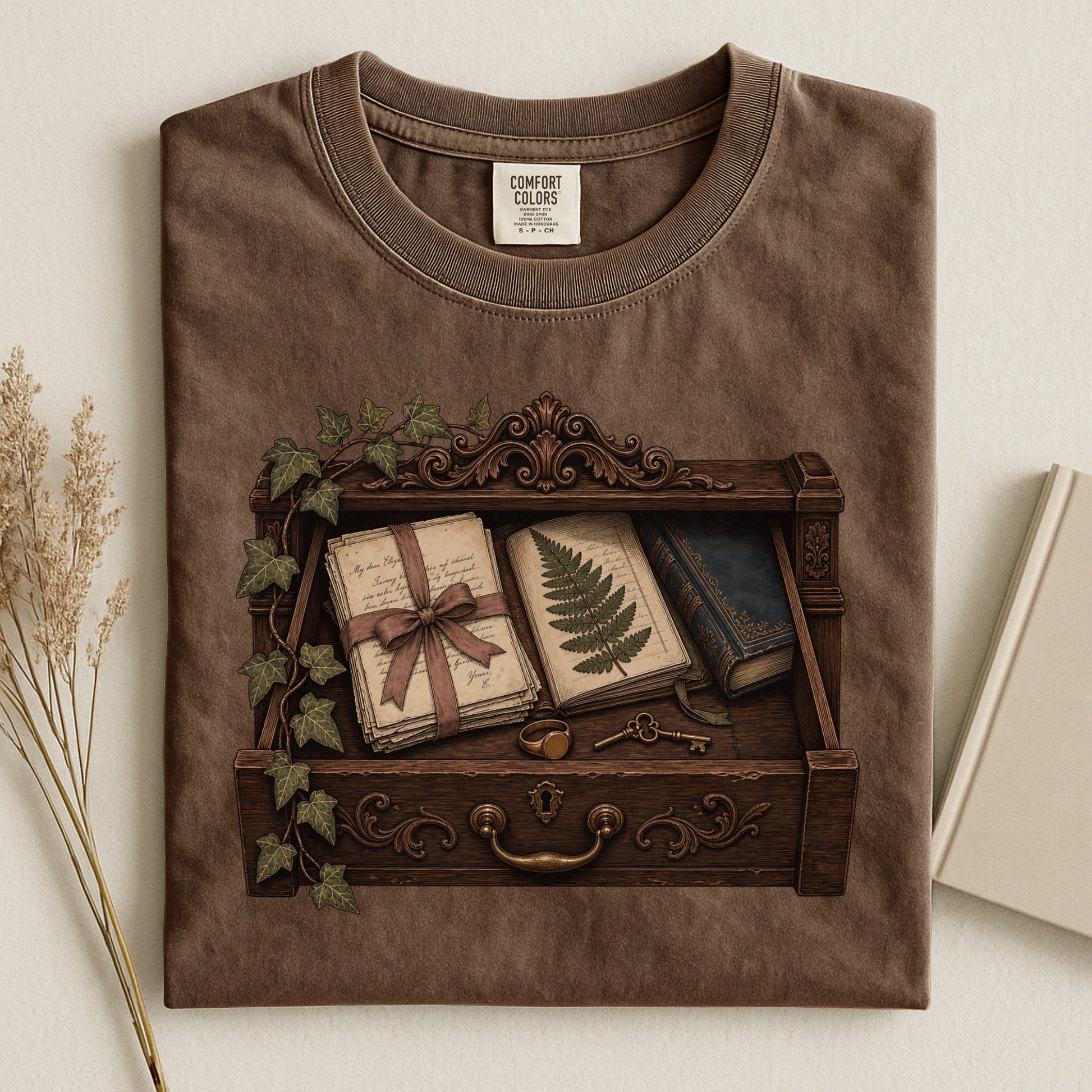 Reader's Keepsake Drawer bookish tee in Espresso, flat lay