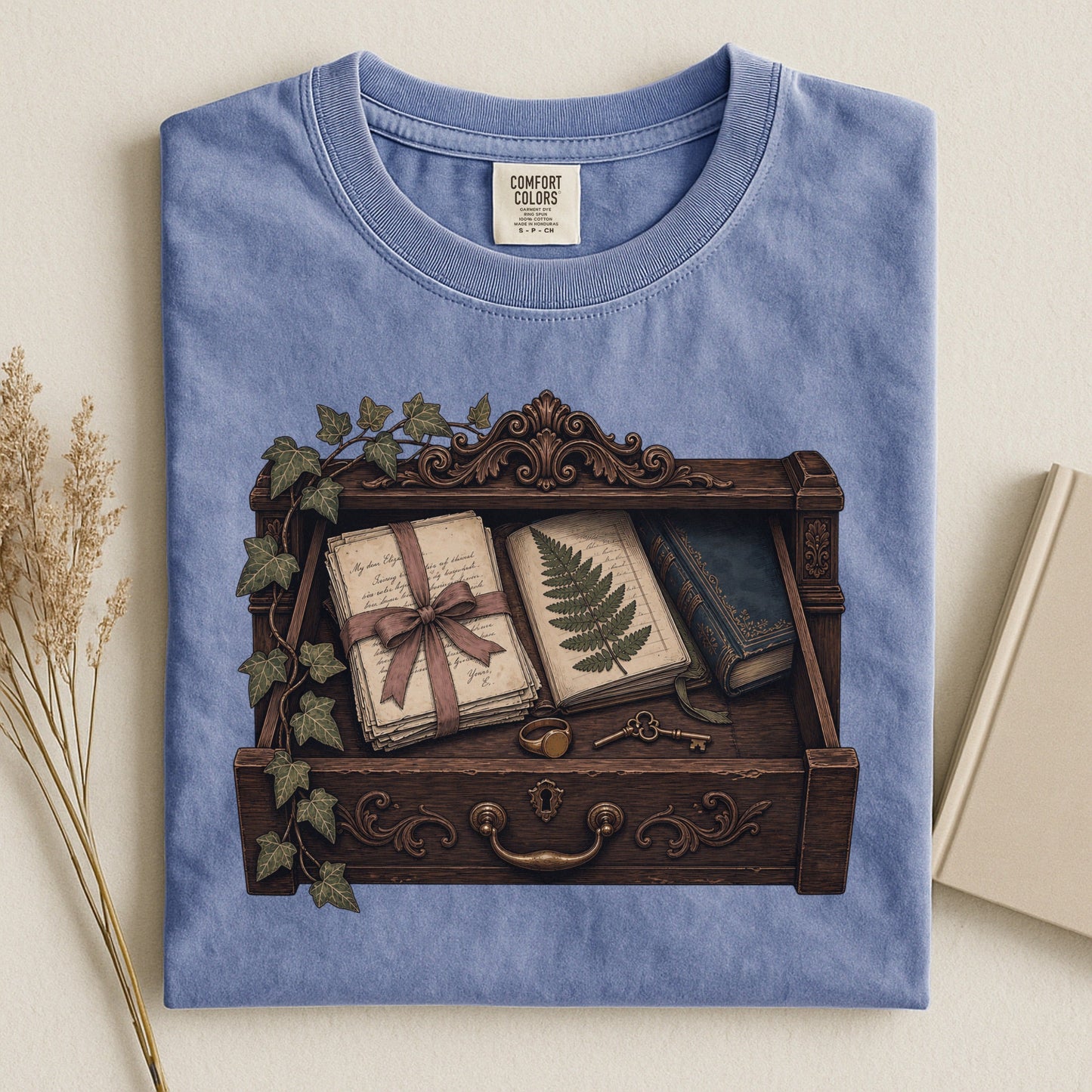 Reader's Keepsake Drawer bookish tee in Blue Jean, flat lay
