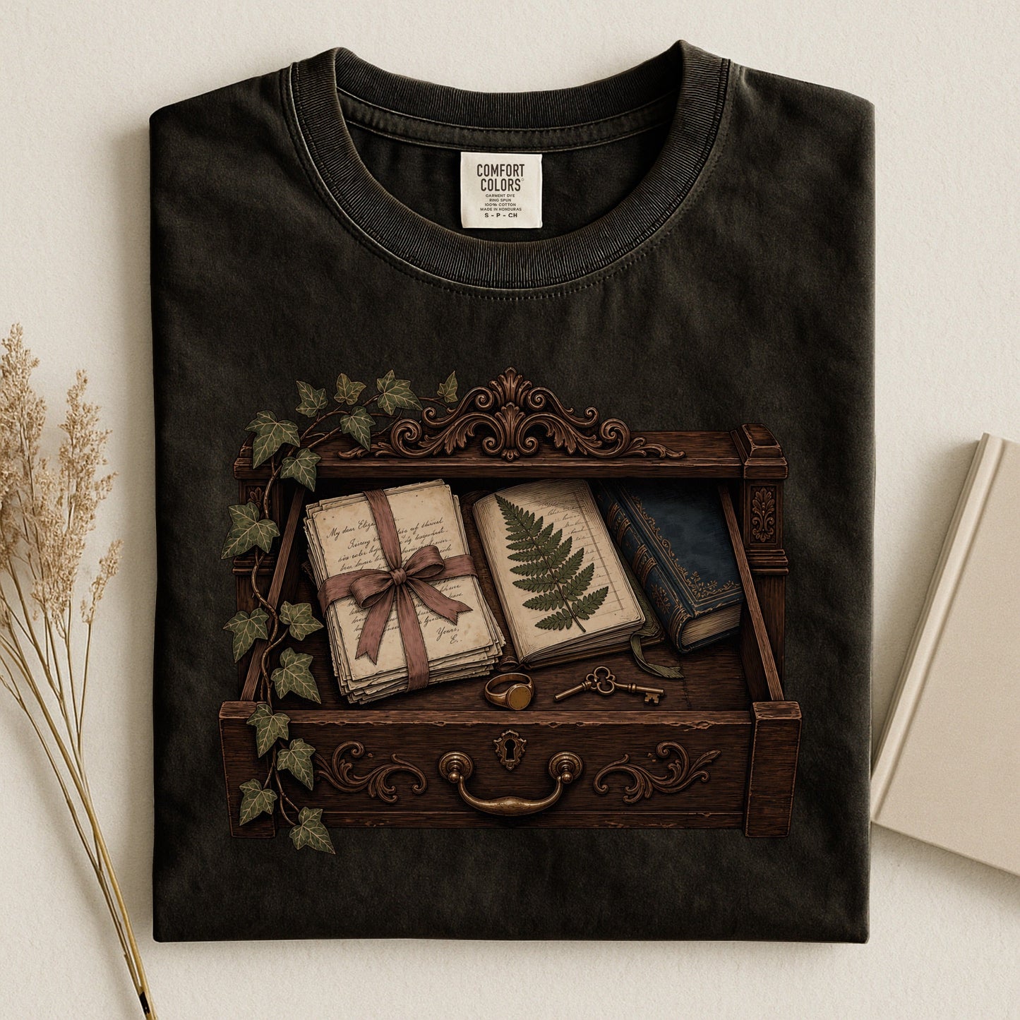 Reader's Keepsake Drawer bookish tee in Black, flat lay