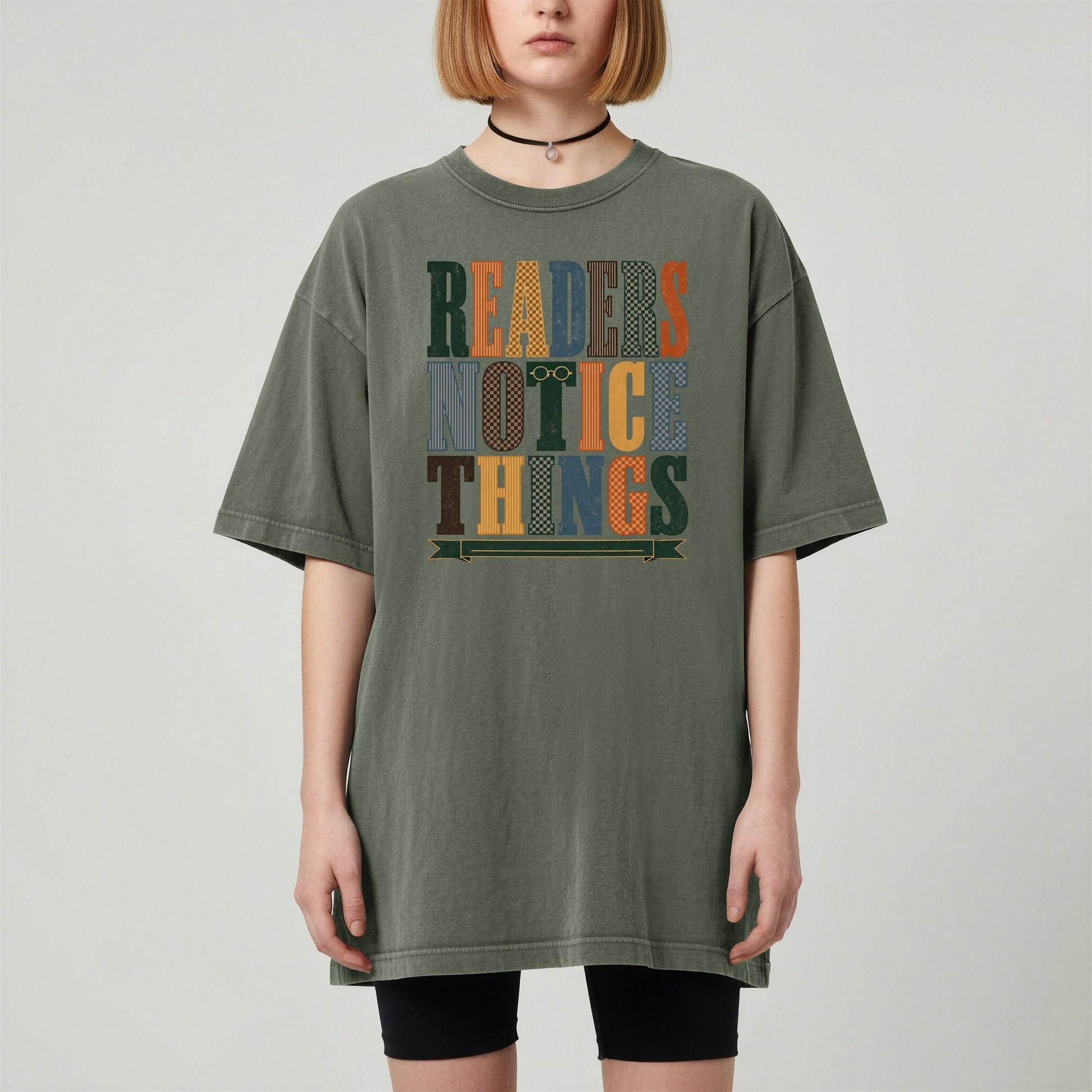 Readers Notice Things bookish tee in Moss, worn