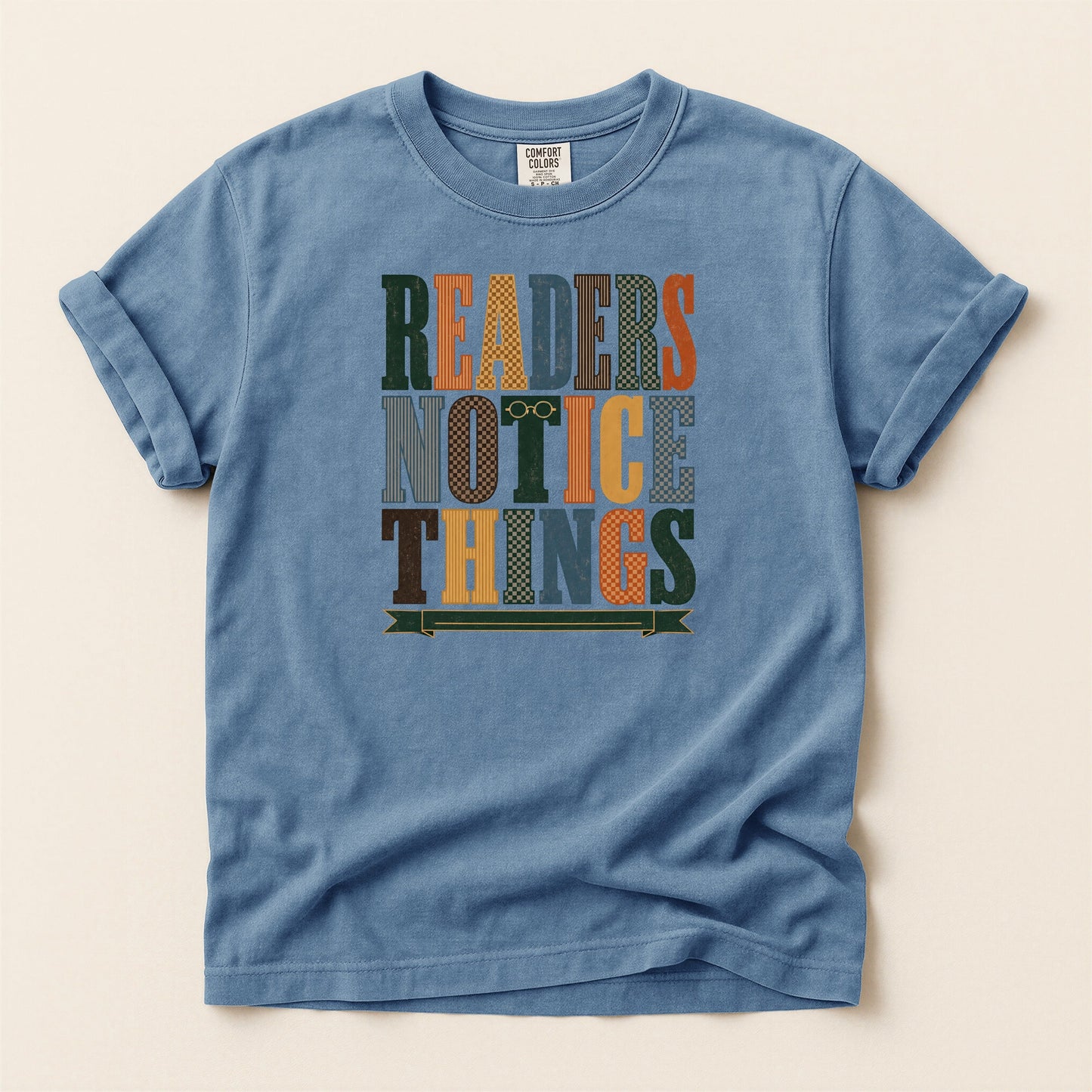 Readers Notice Things bookish tee in Blue Jean, full flat