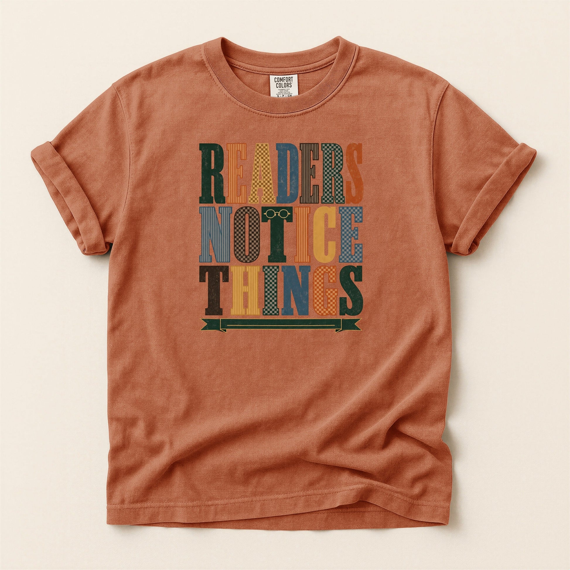 Readers Notice Things bookish tee in Yam, full flat