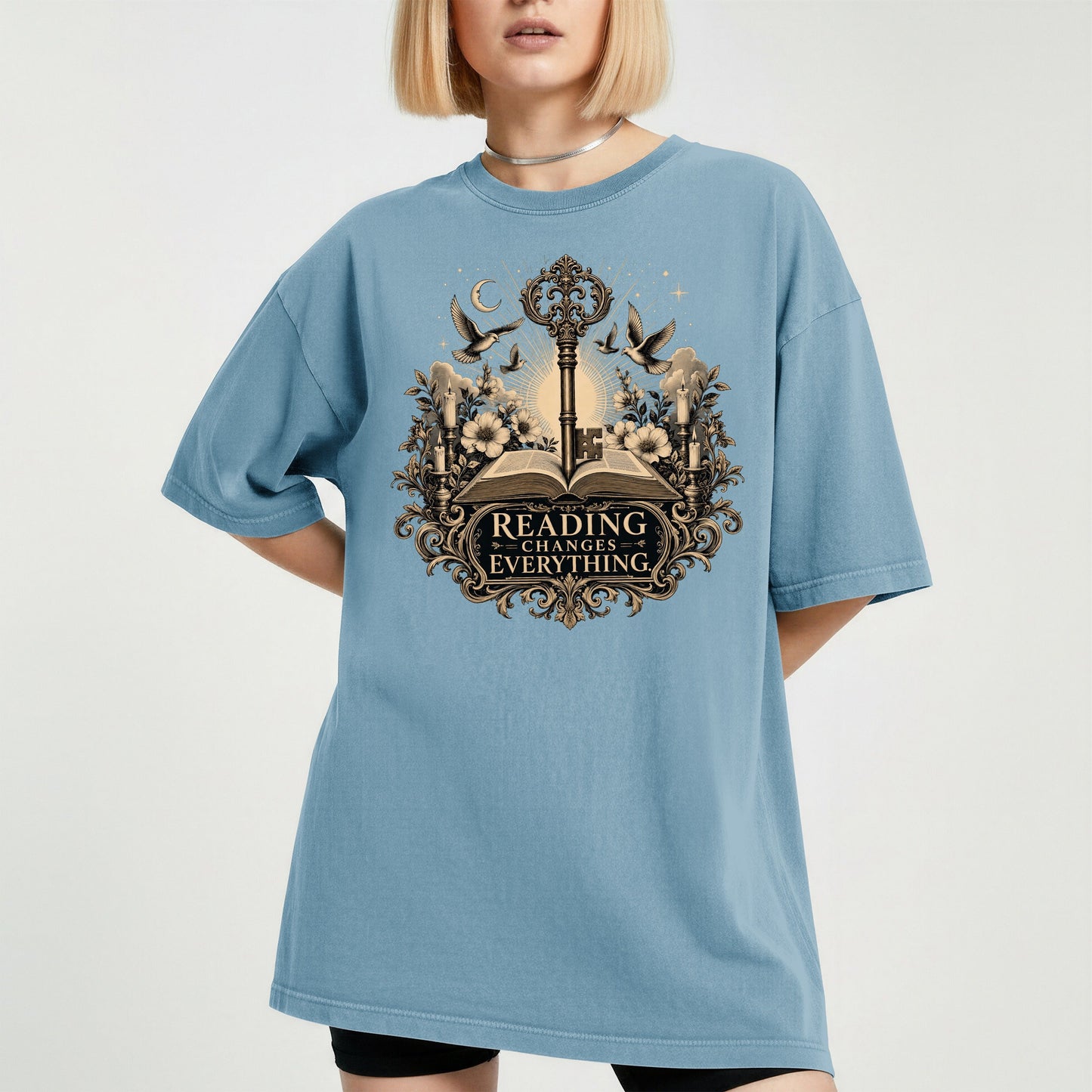 Reading Changes Everything bookish tee in Ice Blue, worn