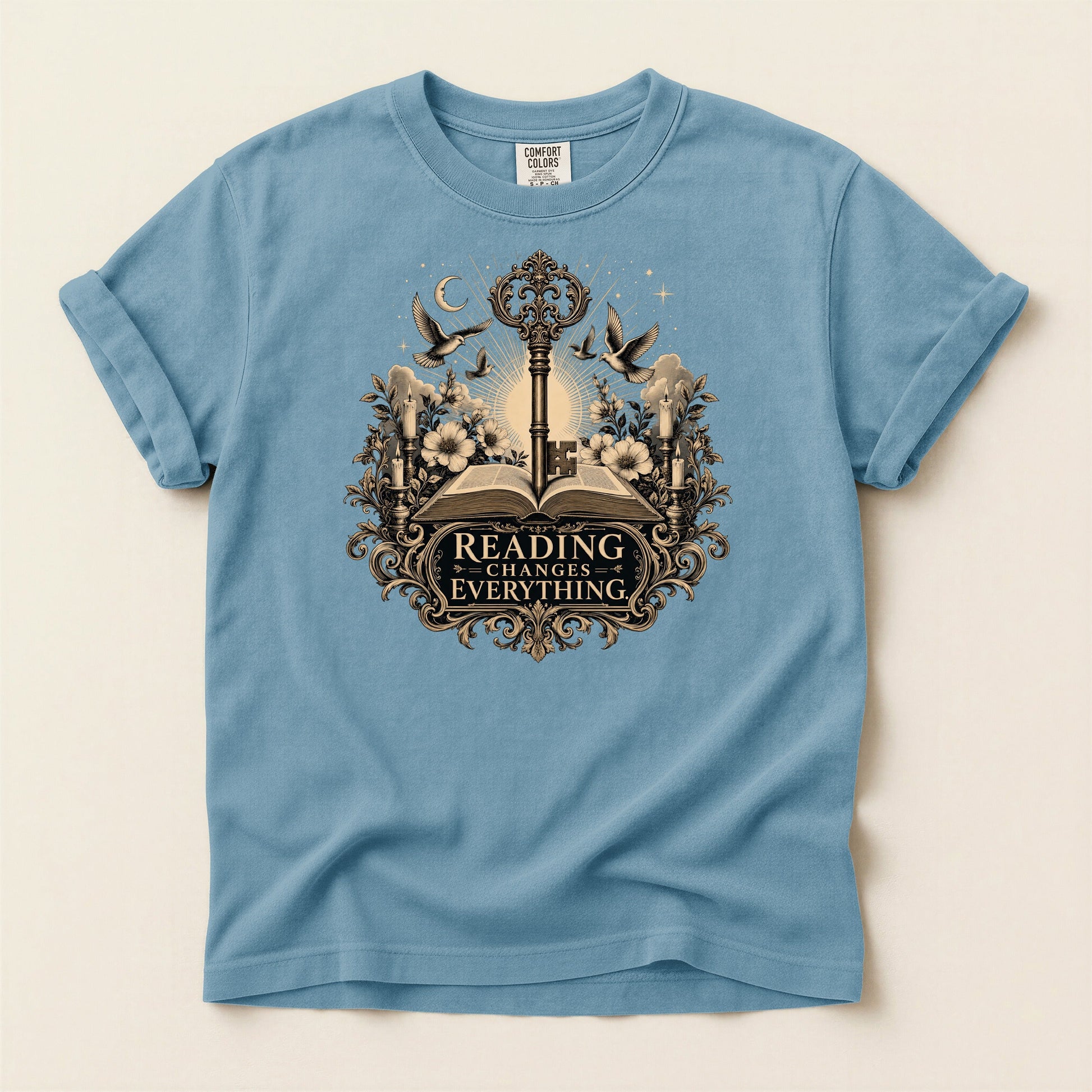 Reading Changes Everything bookish tee in Ice Blue, full flat