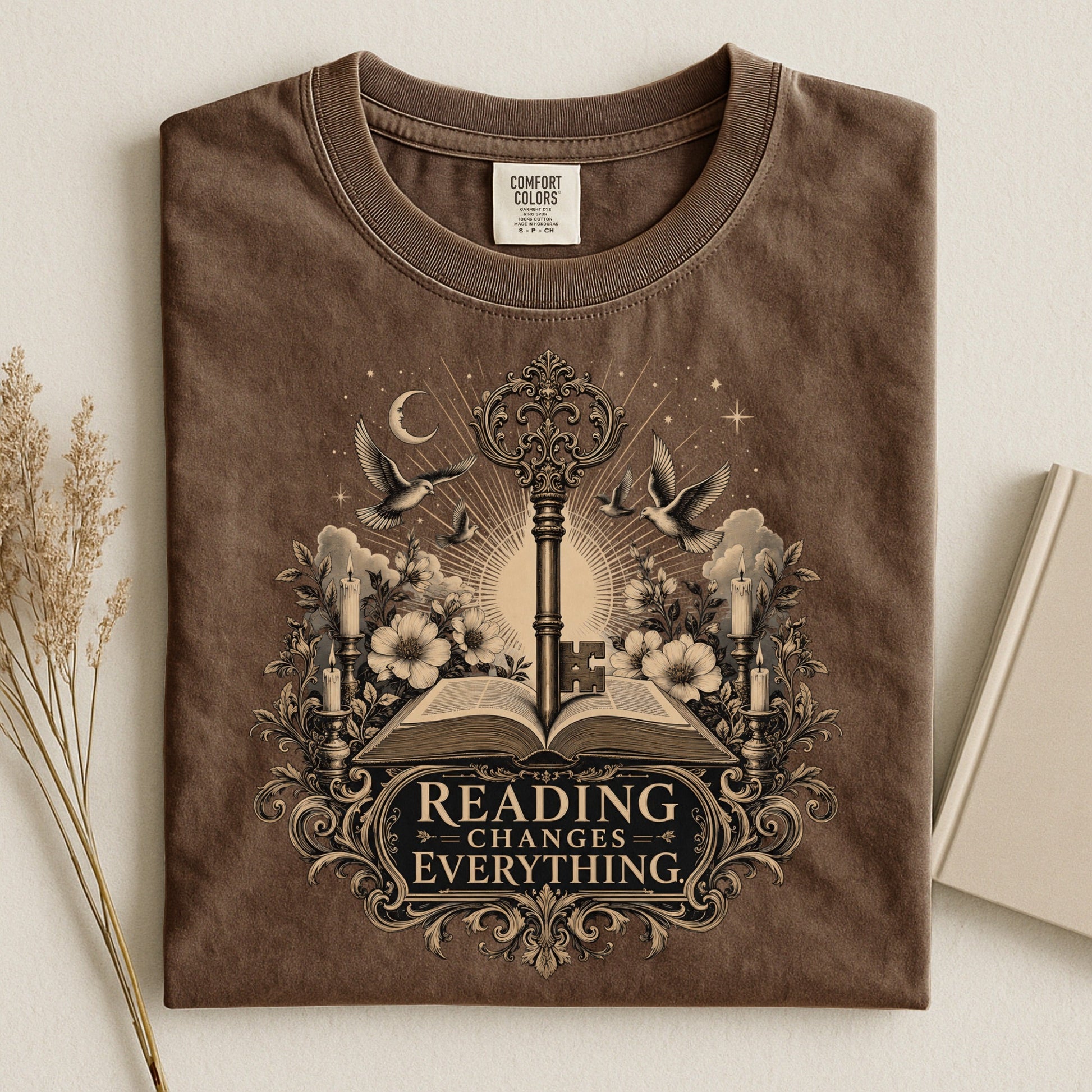 Reading Changes Everything bookish tee in Espresso, flat lay