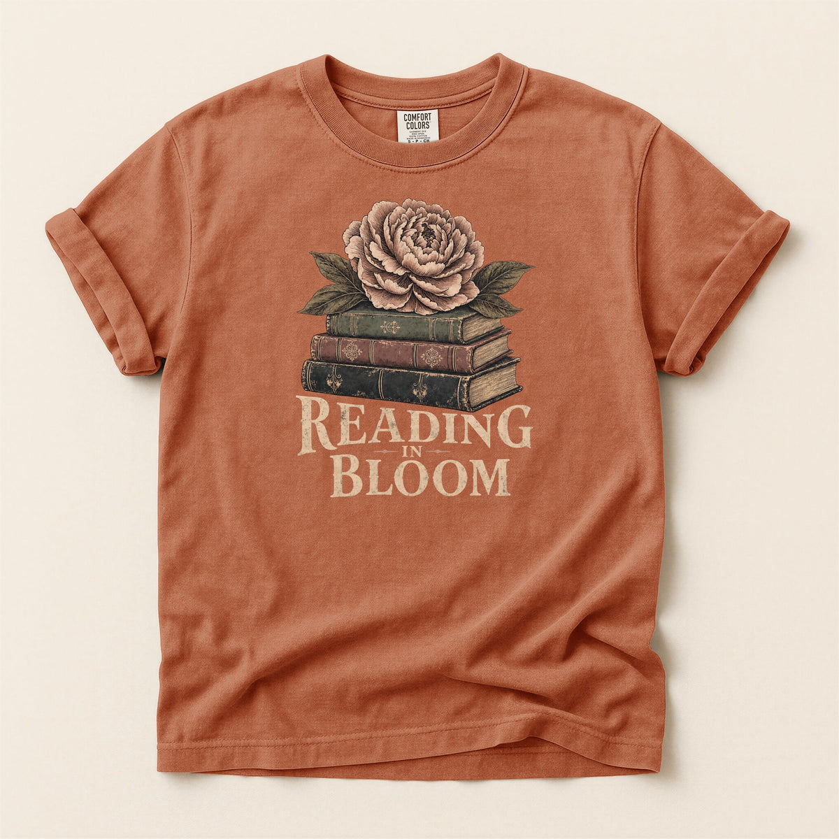 Shelf Love Studio Reading in Bloom t-shirt in Yam, flat