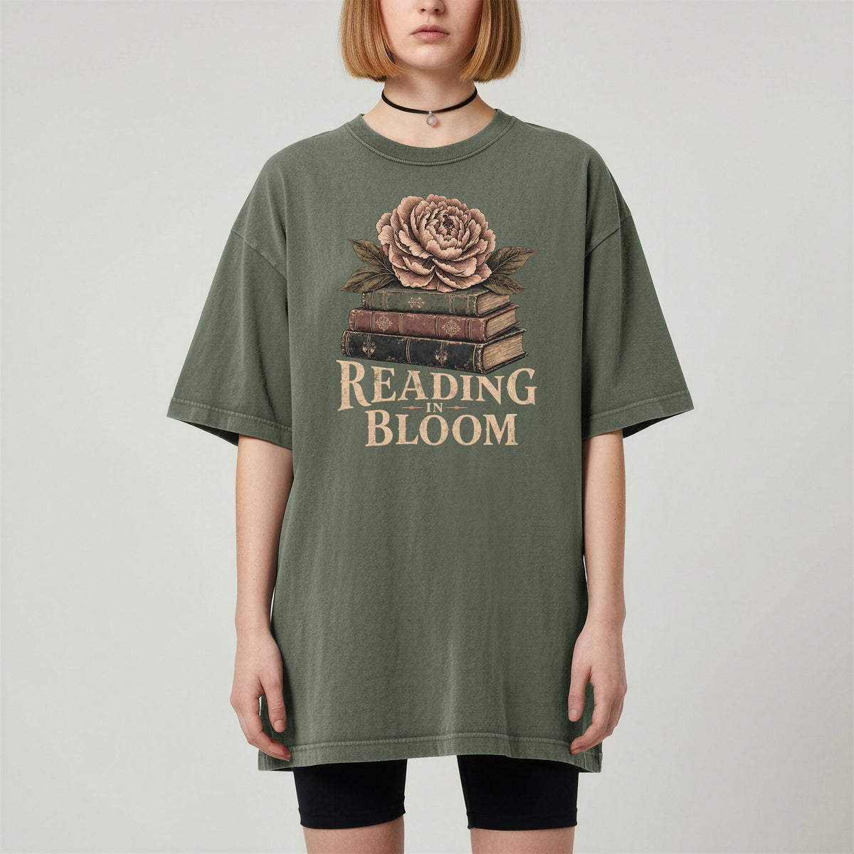 Shelf Love Studio Reading in Bloom t-shirt in Moss, worn