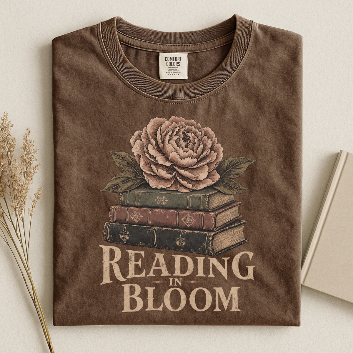 Shelf Love Studio Reading in Bloom t-shirt in Espresso, styled flat lay