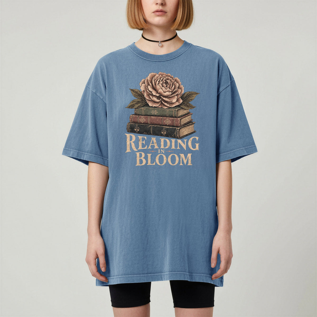 Shelf Love Studio Reading in Bloom t-shirt in Blue Jean, worn