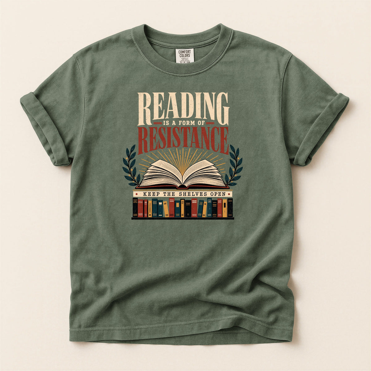 Shelf Love Studio Reading Is a Form of Resistance t-shirt in Moss, flat