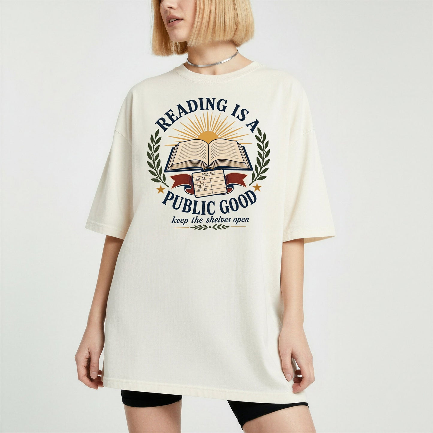 Reading Is a Public Good bookish tee in Ivory, worn
