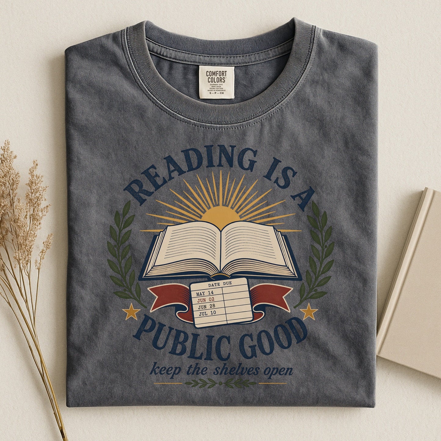 Reading Is a Public Good bookish tee in Pepper, flat lay