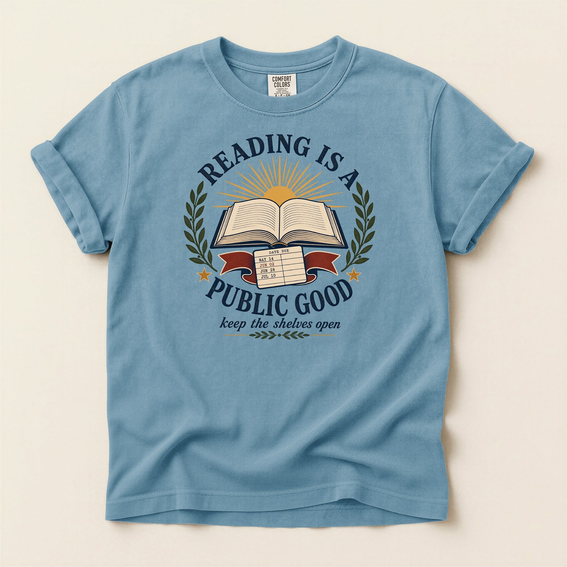 Reading Is a Public Good bookish tee in Ice Blue, full flat