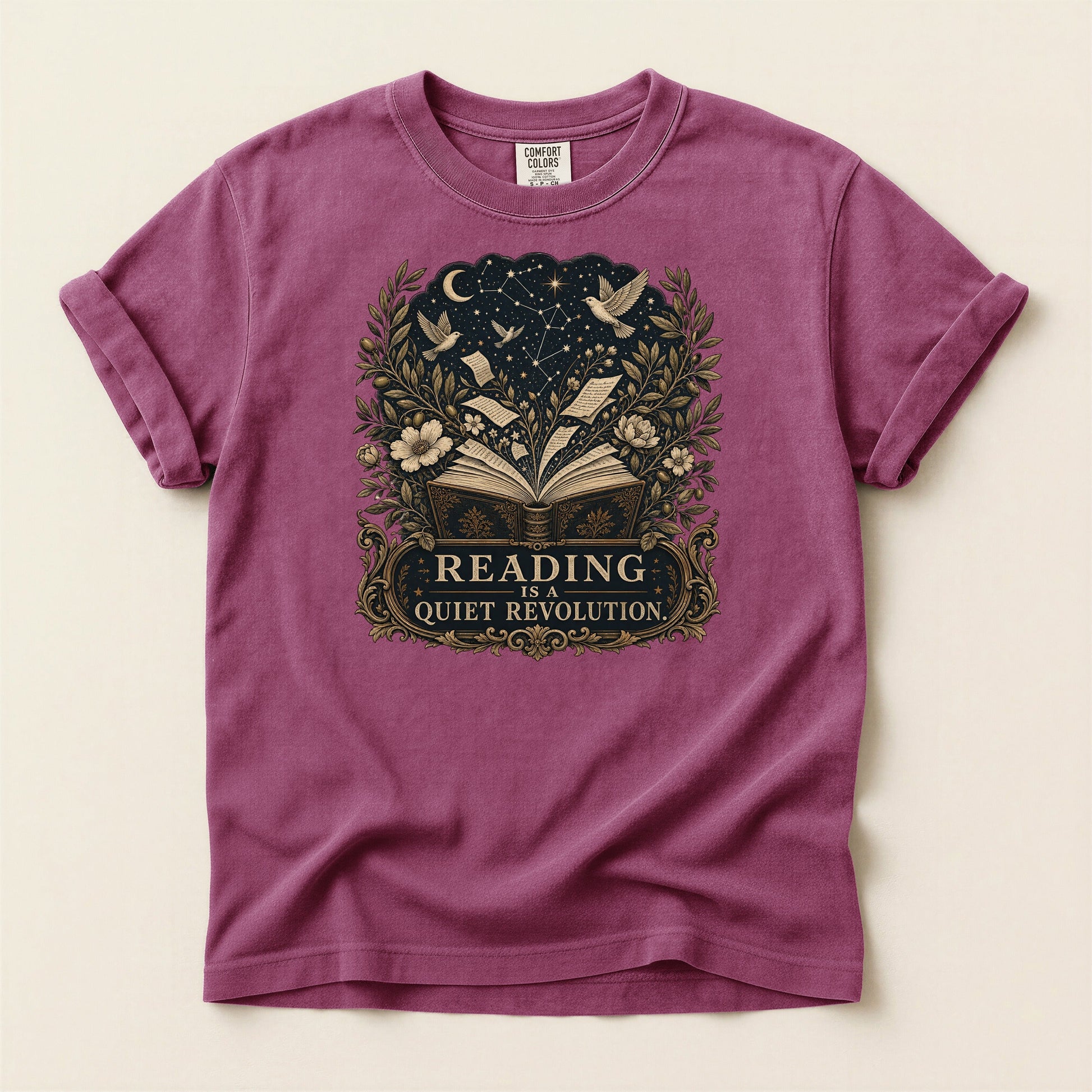 Reading Is a Quiet Revolution bookish tee in Berry, full flat