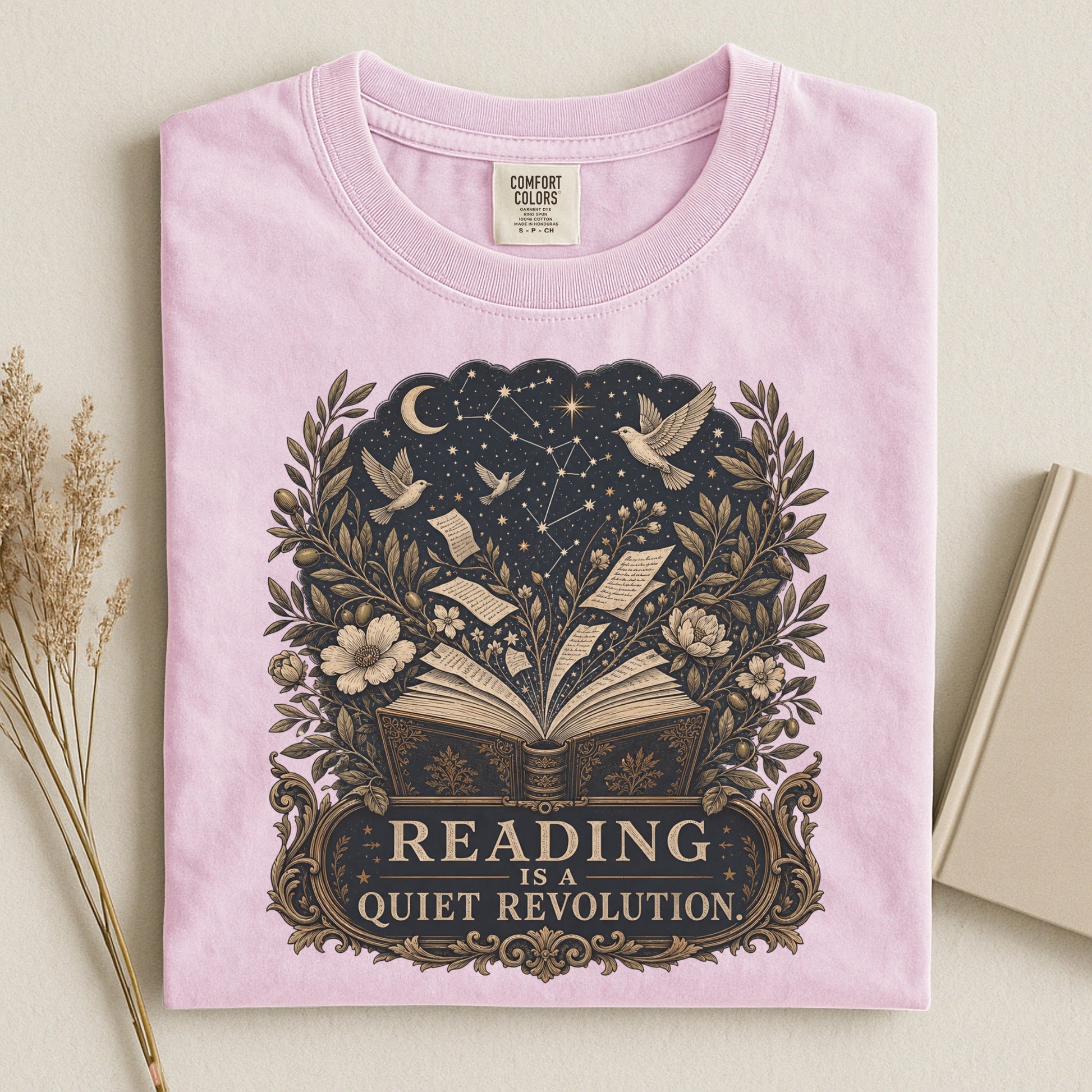 Reading Is a Quiet Revolution bookish tee in Blossom, flat lay