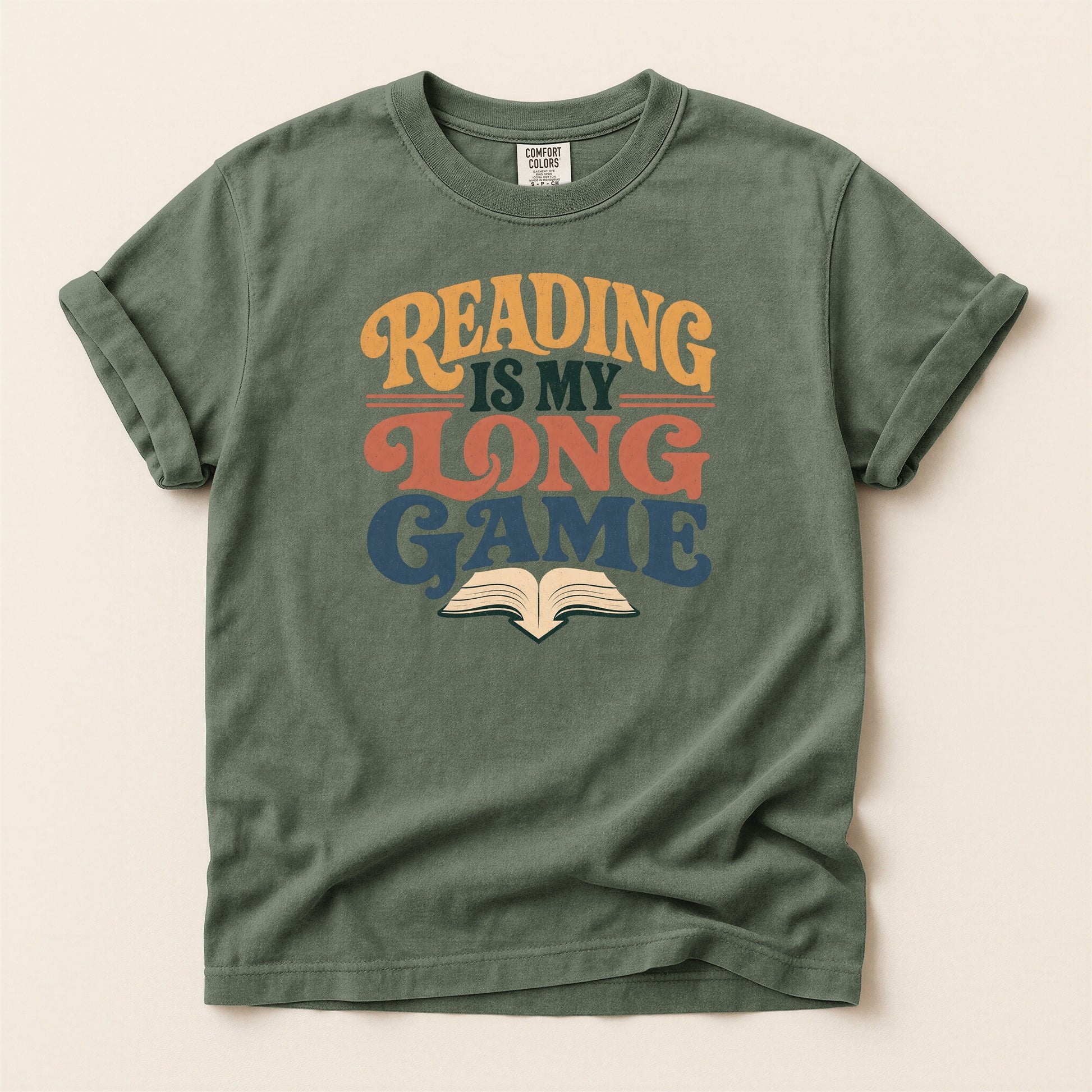 Reading Is My Long Game bookish tee in Moss, full flat