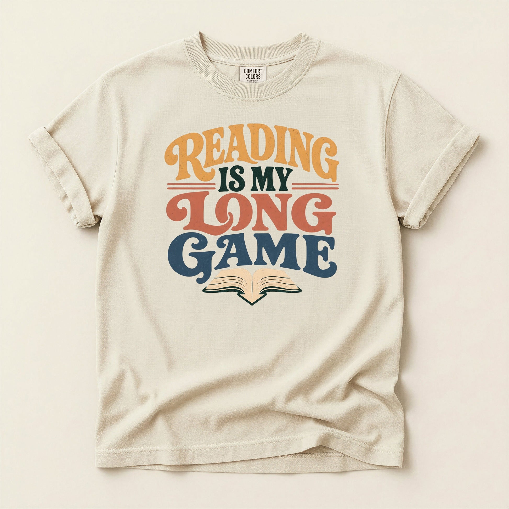 Reading Is My Long Game bookish tee in Ivory, full flat