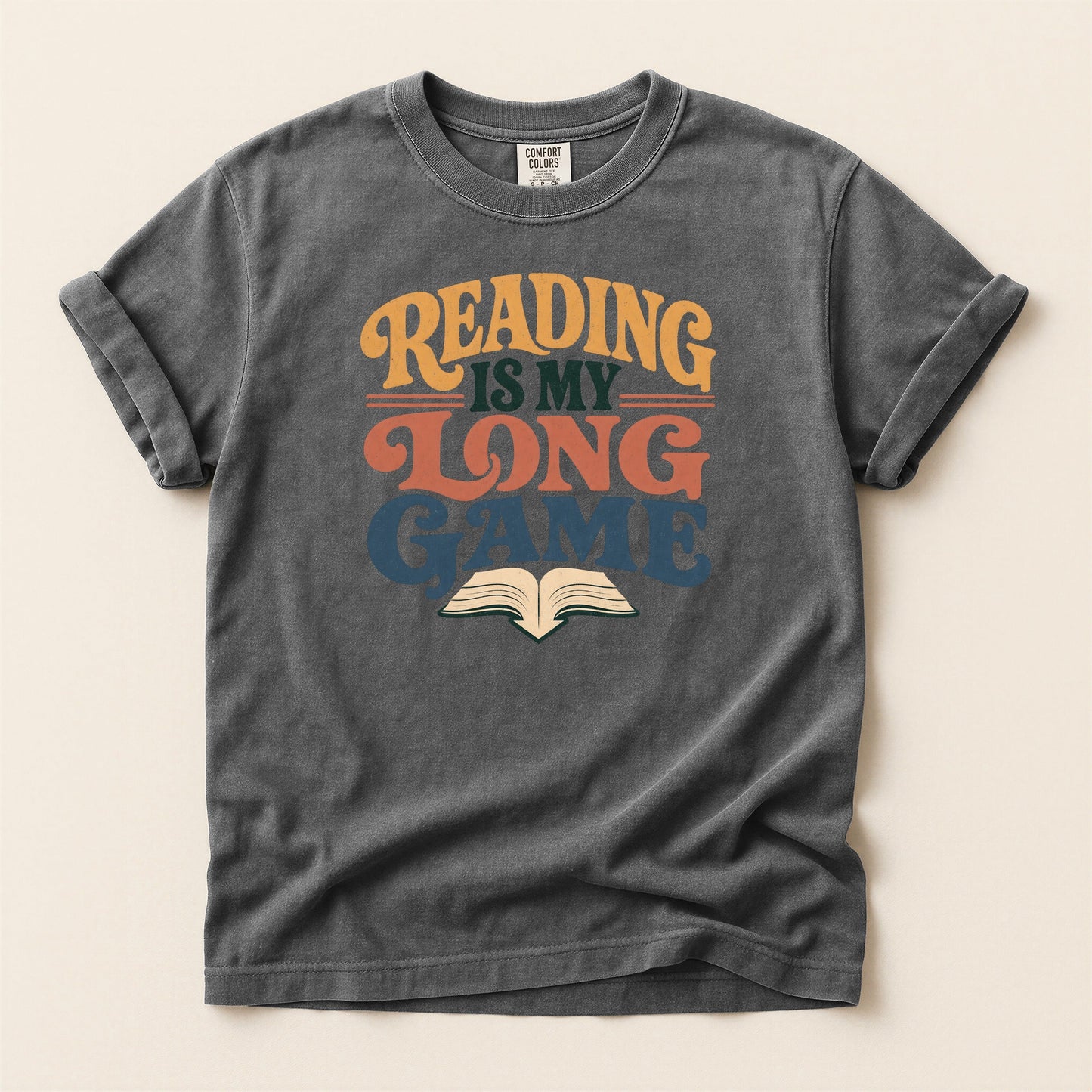 Reading Is My Long Game bookish tee in Pepper, full flat