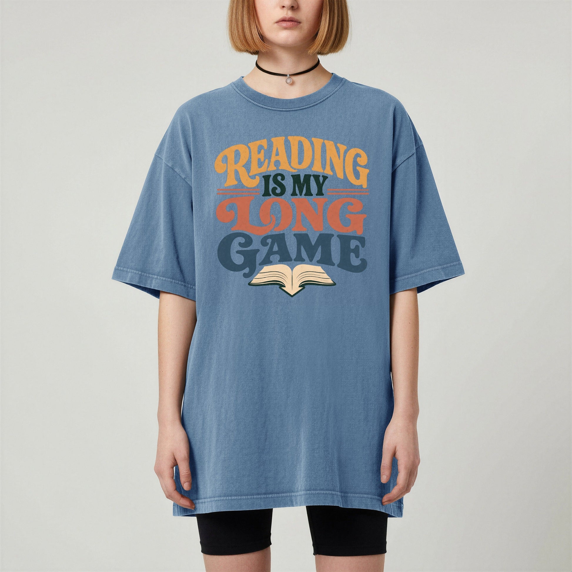Reading Is My Long Game bookish tee in Blue Jean, worn